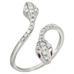 Bague serpent en or blanc 18 carats diamant blanc rubis