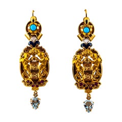 Boucles d'oreilles à levier en or jaune avec diamants blancs, rubis, aigue-marine, turquoise et émail