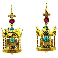 Orecchini "Carousel" in oro giallo con diamante bianco, rubino, perla e smalto turchese