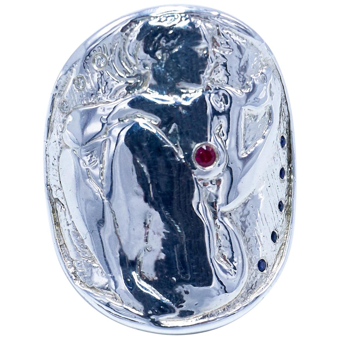 3 pcs White Diamond 1 Pc Ruby 5 pcs Blue Sapphire Medal Ring Coin Ring with a Woman looking at a mask -  Art Nouveau Style

J DAUPHIN 