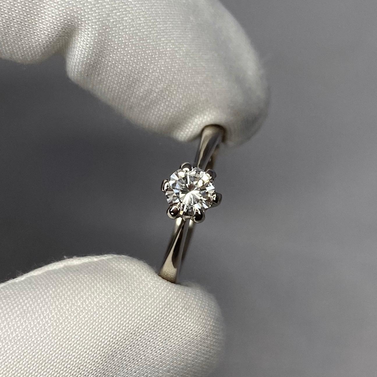 Solitaire 18 Karat White Gold Diamond Ring

0.48 carat diamond with SI2 clarity and G colour. Also has a very good round brilliant cut to show lots of light return and sparkle. 

Ring size J1/2. The ring is re-sizeable.
Fully hallmarked to guarantee