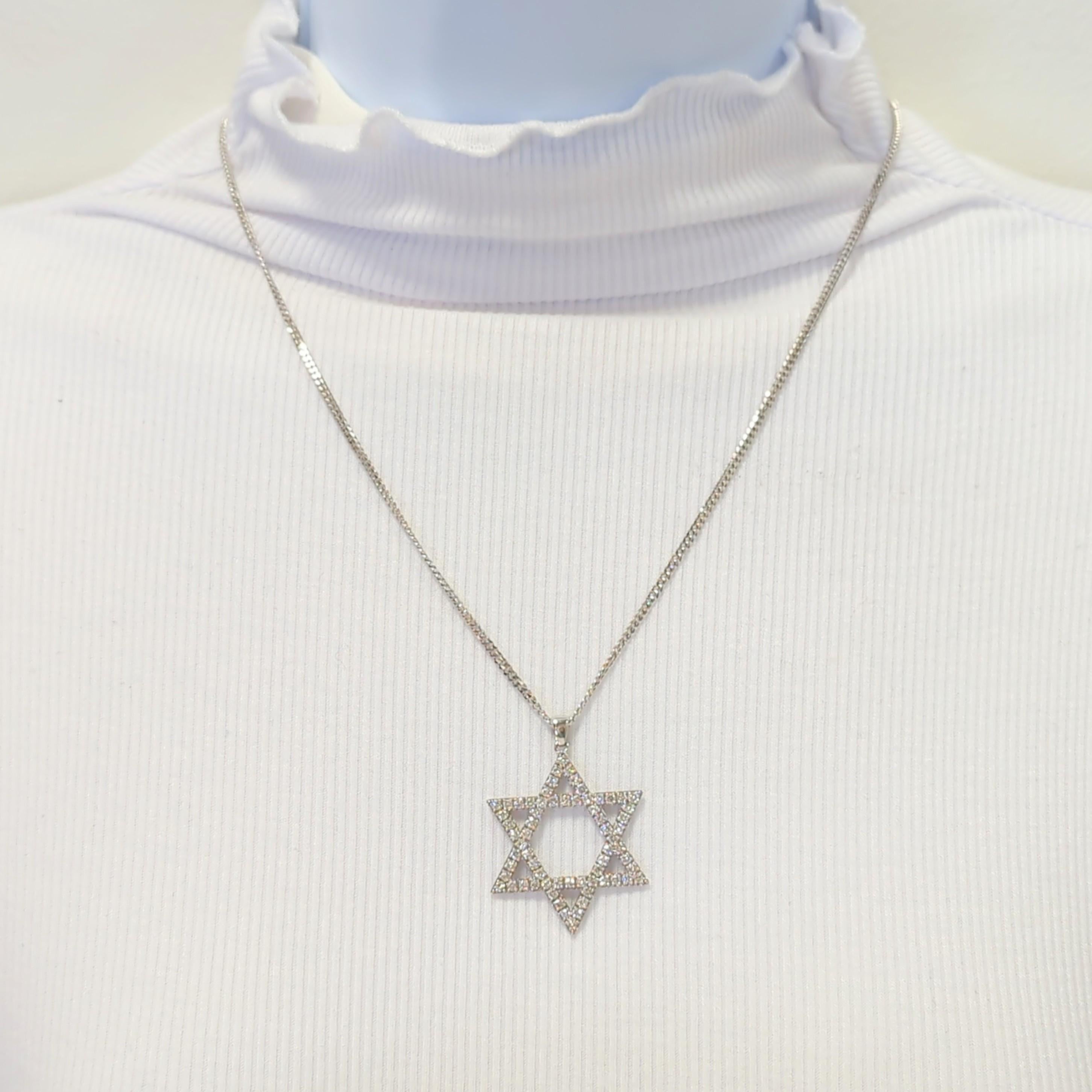 Beautiful Star of David pendant necklace with good quality white diamond rounds.  Handmade in 14k white gold.  Length is 20