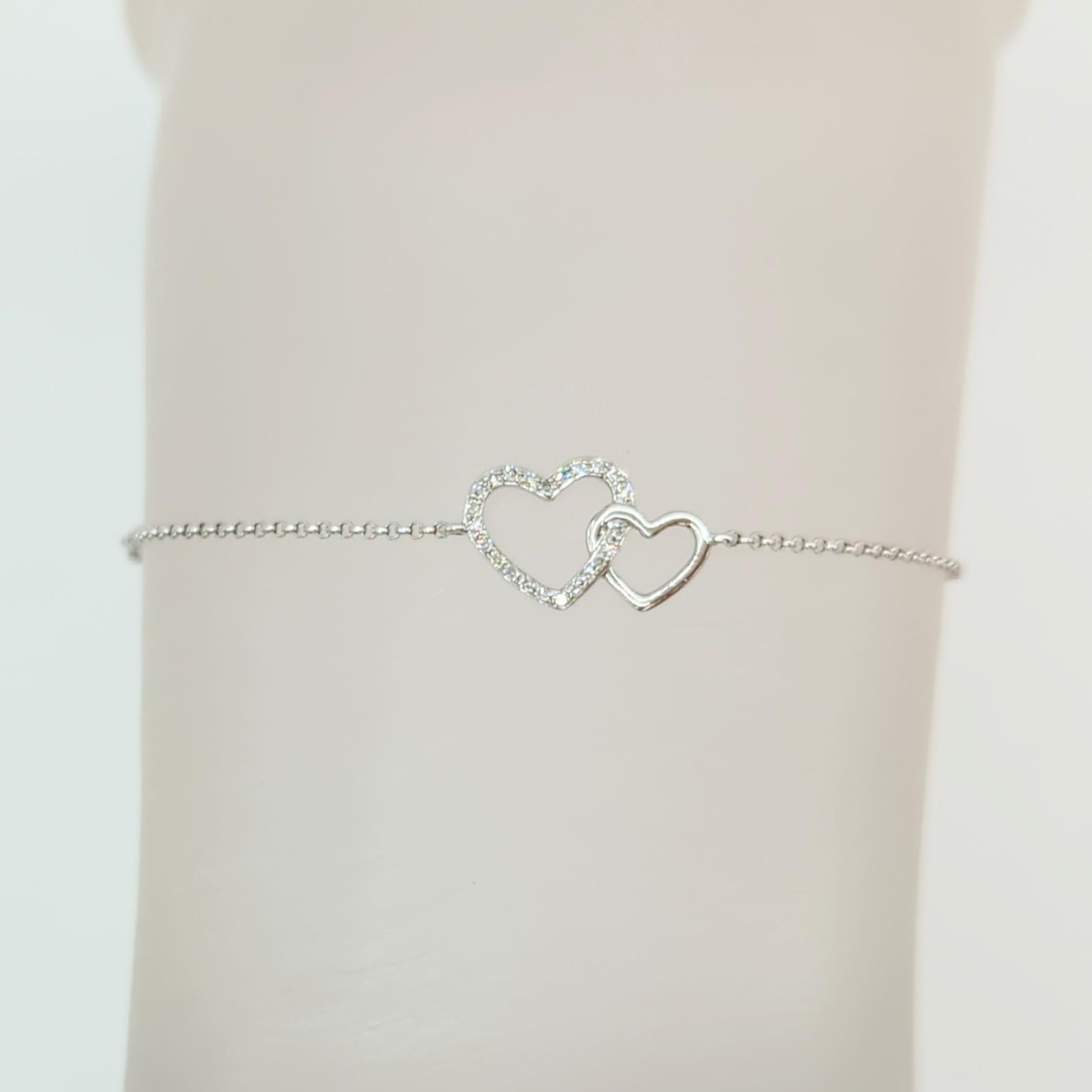 Round Cut White Diamond Two Hearts Bracelet in 18K White Gold For Sale