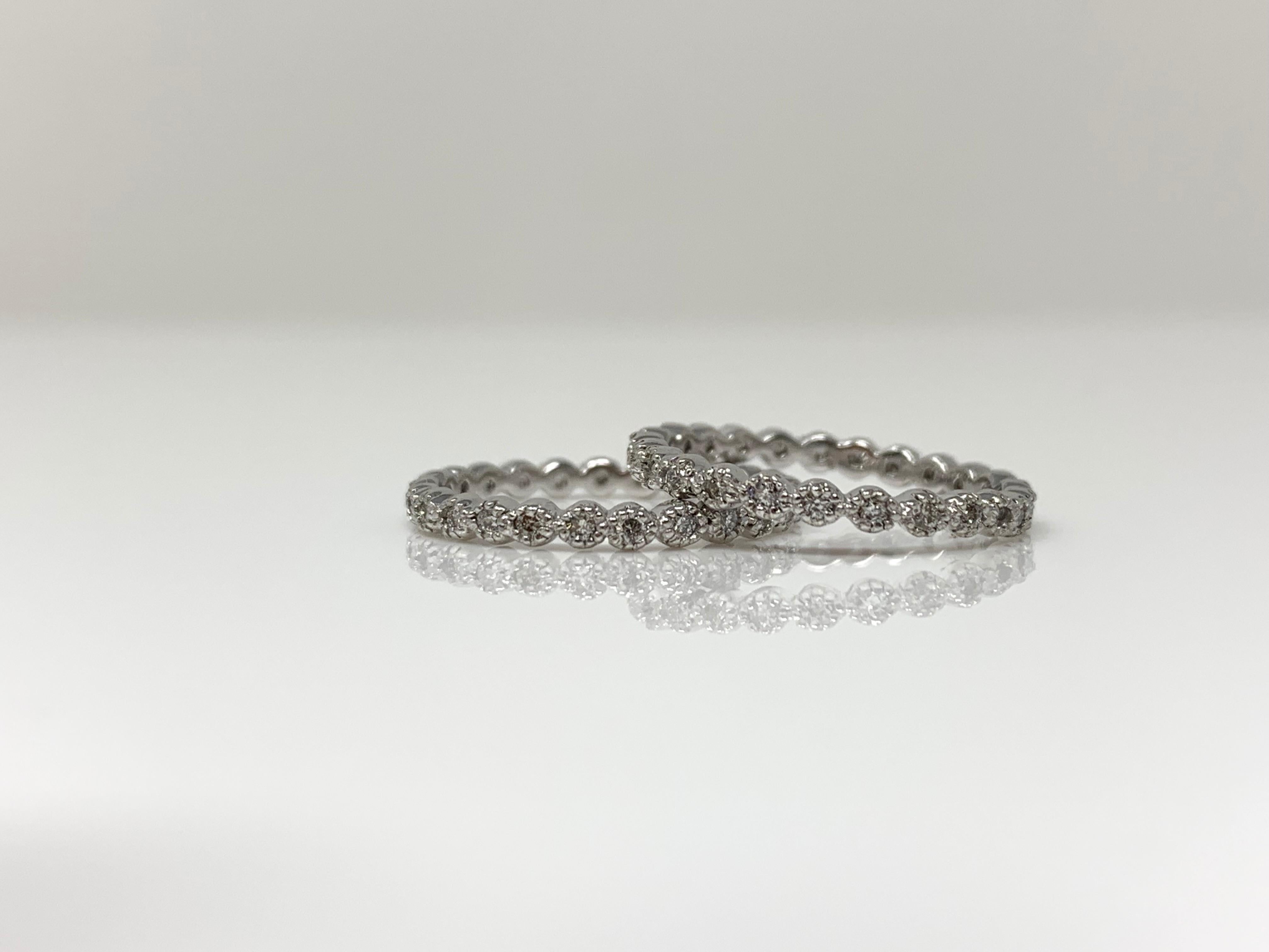 Elegant two white diamond wedding bands in 18k. 
Diamond weight : 0.50 carat ( 0.25 carat each band ) 
Metal : 18k 
Ring size : 4 
