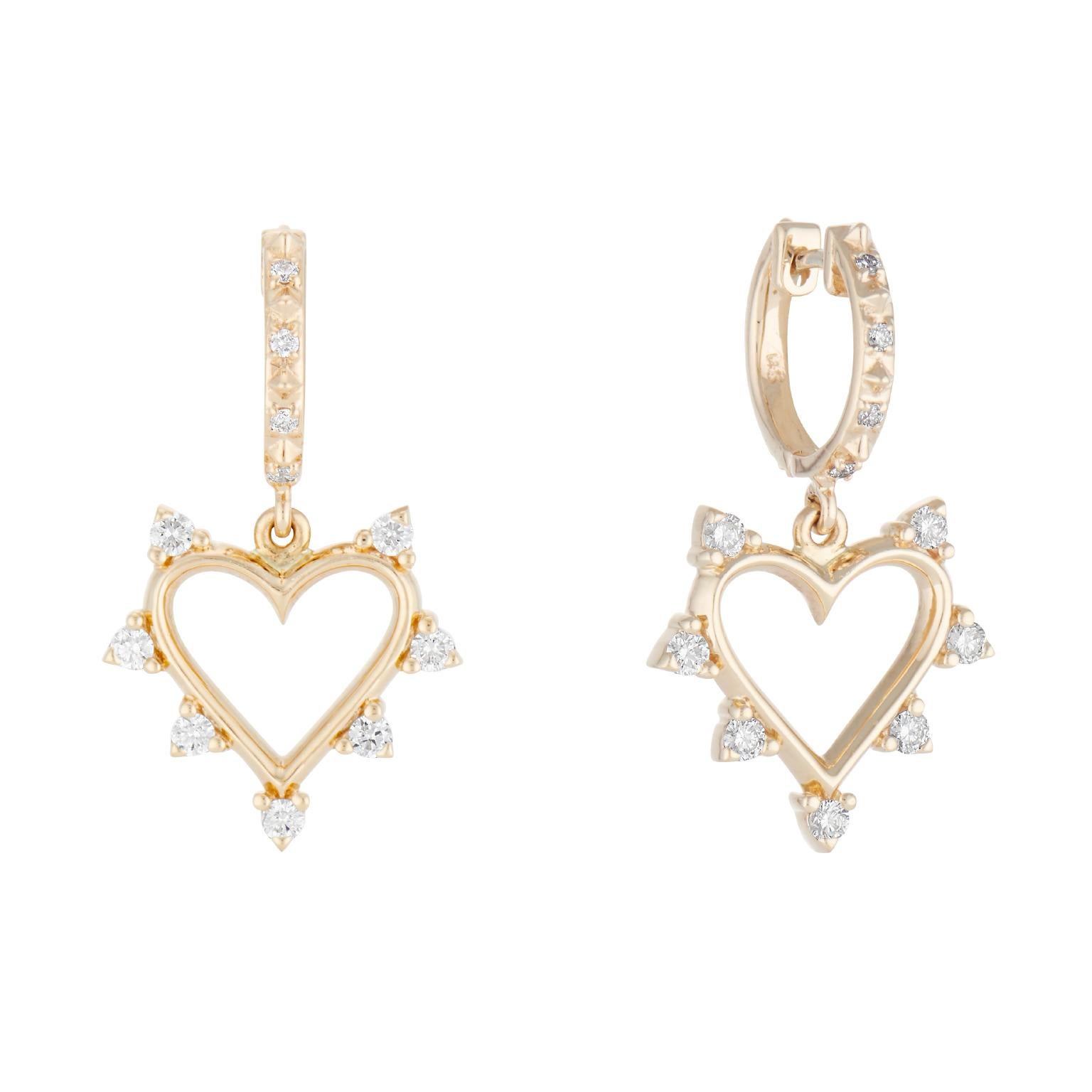 These Marlo Laz Open Heart Hoop Earrings serve as a reminder to approach everything with an open heart, open soul, and open mind. These romantic 14 Karat yellow gold love earrings feature a spiked border of white diamonds and Pave diamond hoops that