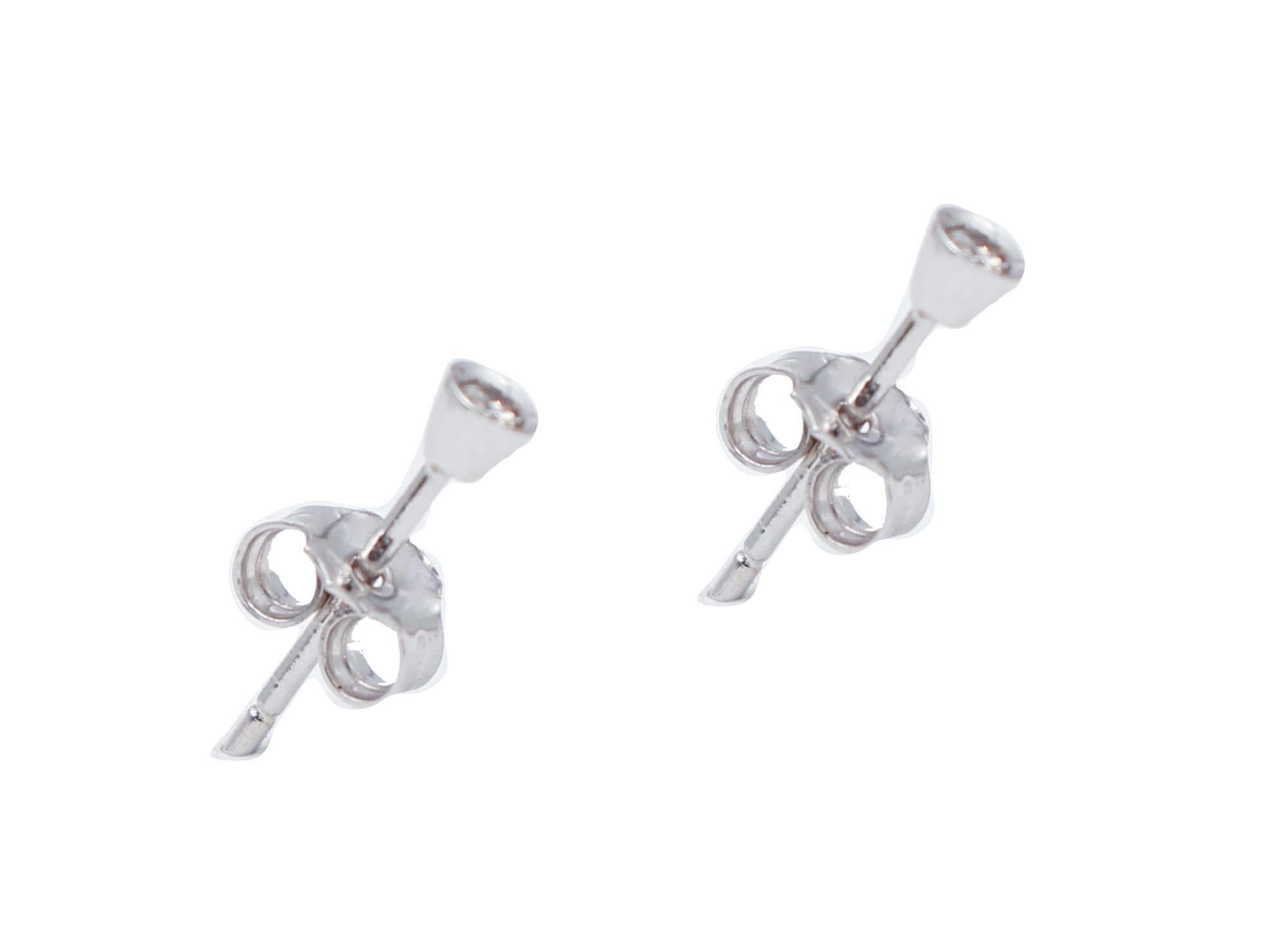 Modern White Diamonds, 14 Karat White Gold Stud Earrings For Sale