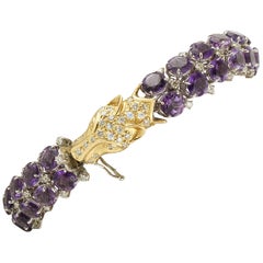 White Diamonds Amethysts 18 Karat Yellow and White Gold Wolf Head Link Bracelet