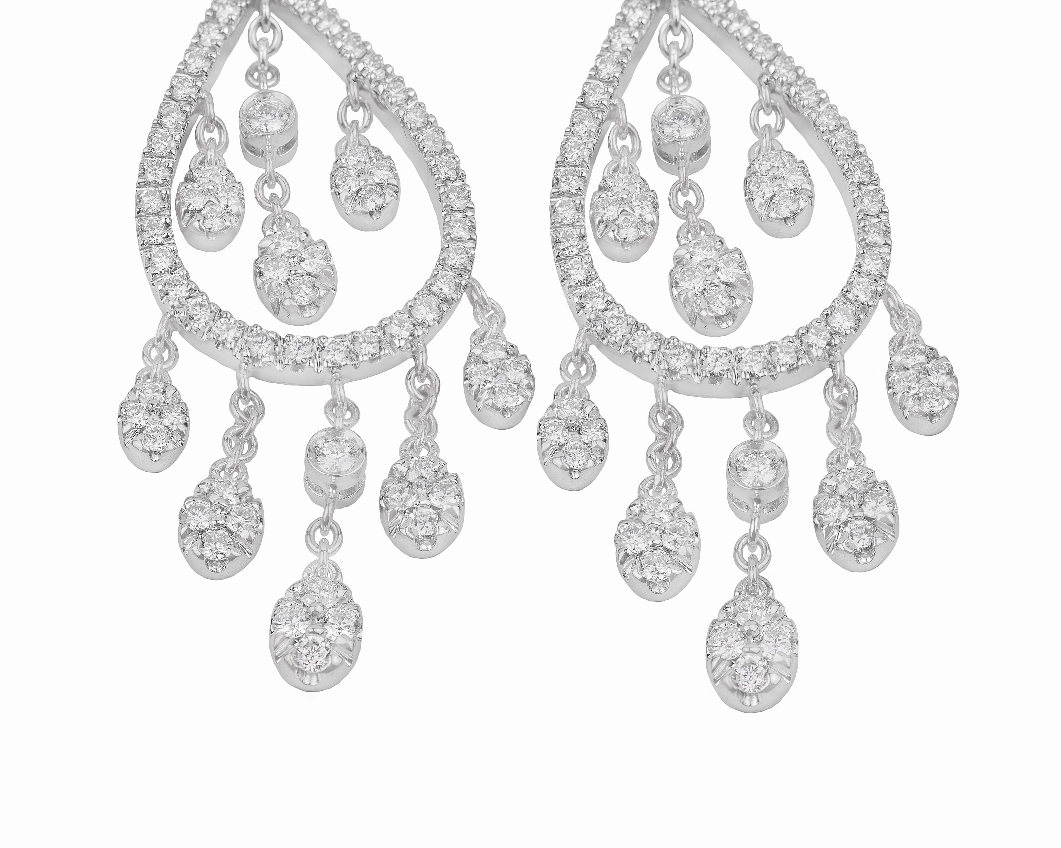 These elegant and bright 18K white gold earrings are made in Italy by Fanuele Gioielli.
They feature a lever-back closure and a drop shape. These earrings are entirely made of white gold and brilliant cut white diamonds.

Diamonds total content is