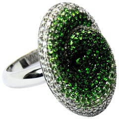 White Diamonds and Tsavorites Oval Spiral Cocktail Ring in 18 Karat White Gold