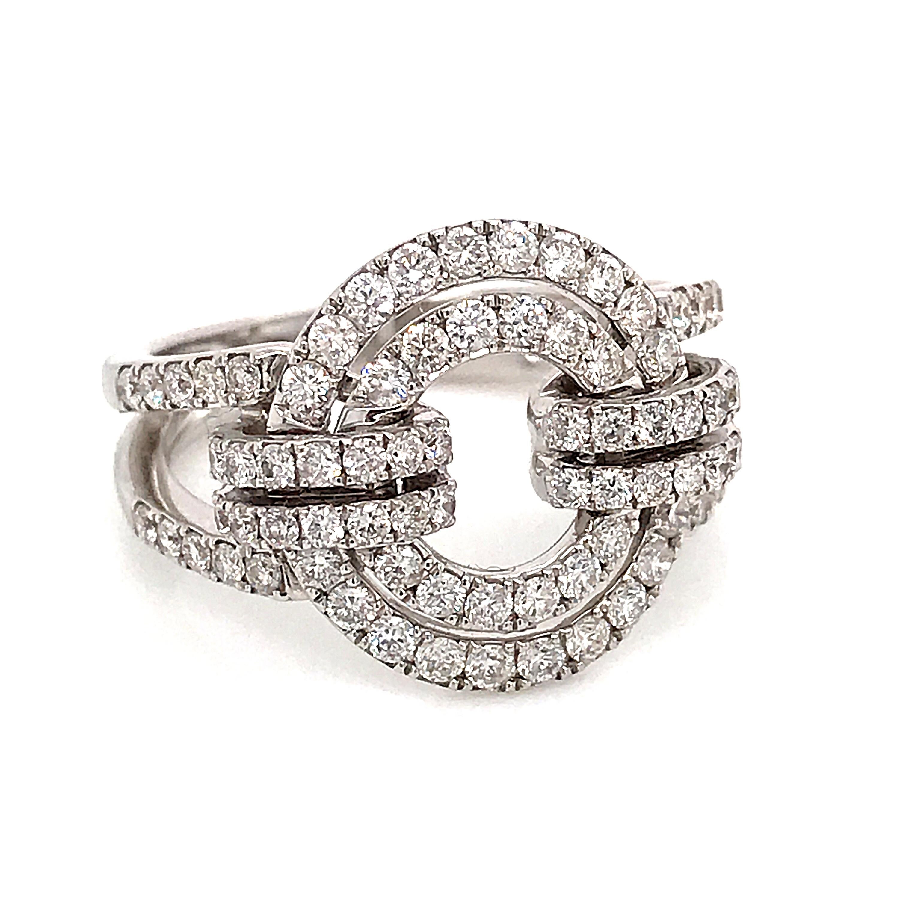 Beautiful White Gold and Diamonds Articulated Circle Ring.
White Gold 18 Carat Weight Gold 6.20 grams 
White Diamonds 0,98 Carat  color H Purity SI Brilliants cut
French Size 55
US Size 7.5
