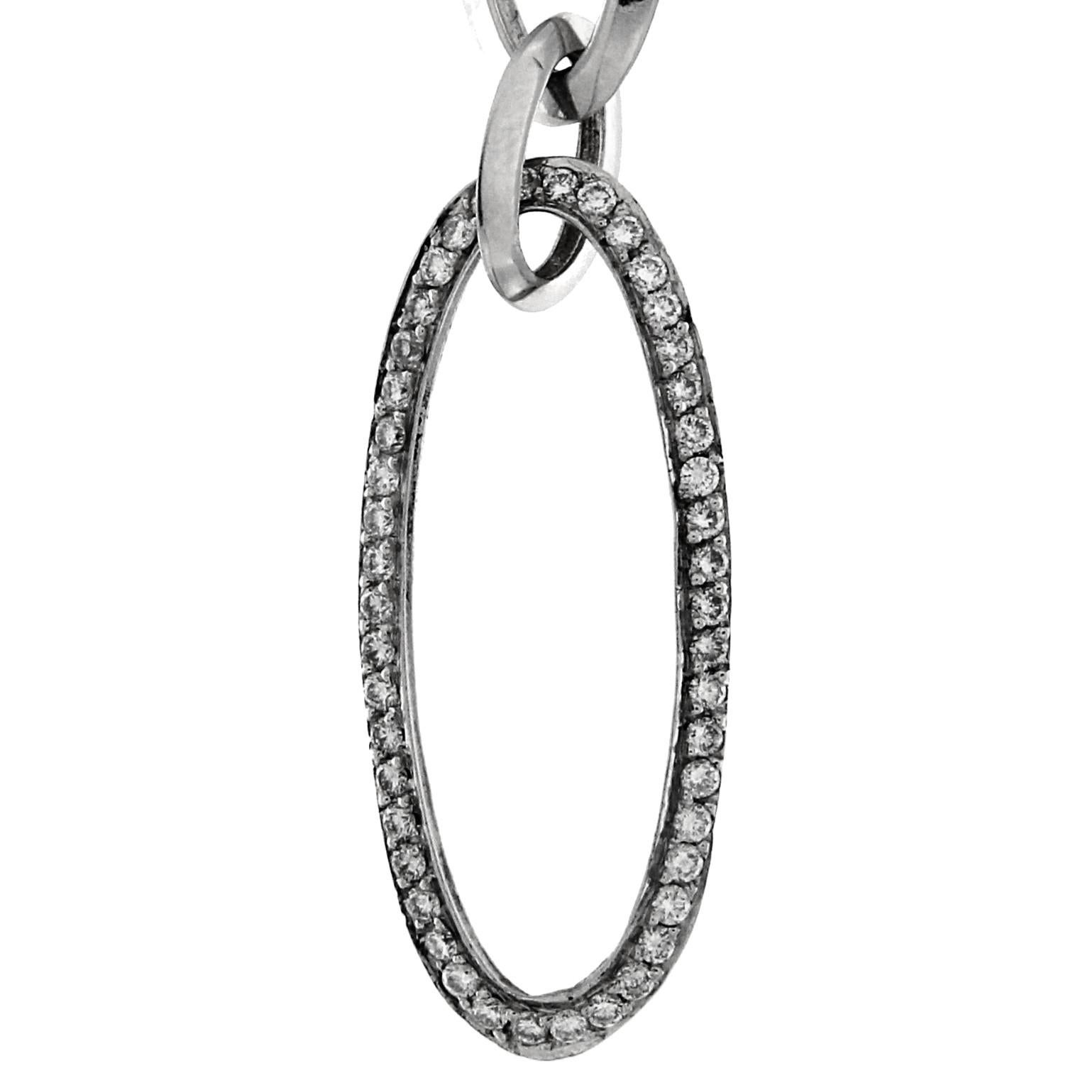 Description:
This stunning necklace from the Ovalina collection showcases a harmonious blend of modern design and timeless elegance. Crafted from 18K white gold, it features an intricate arrangement of oval geometrical shapes, creating a necklace