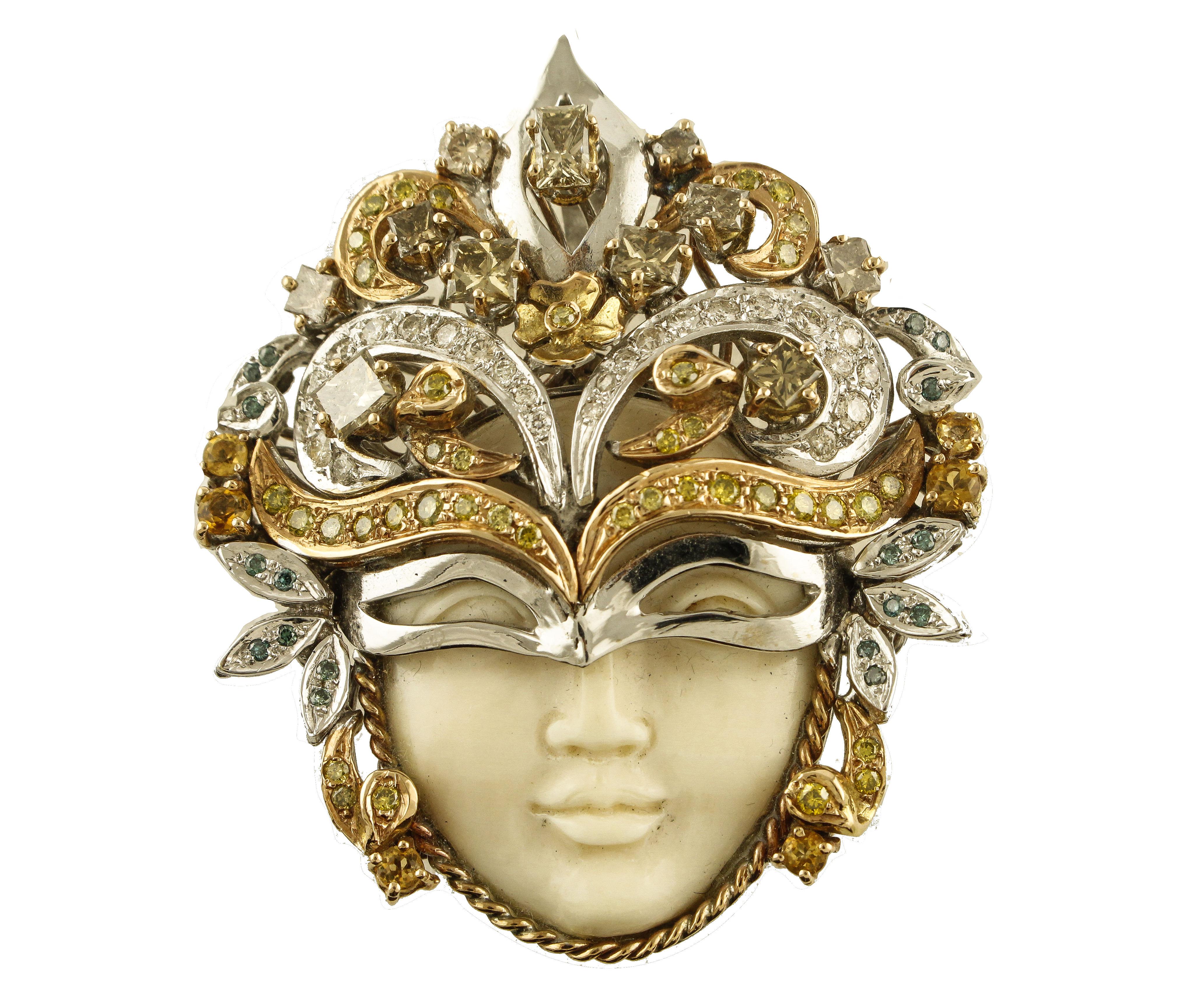 Beautiful Venetian mask, mounted in 14 kt rose and white gold, composed of a carved hard stone face, the whole mask is embellished with blue, brown and yellow fancy diamonds,and yellow topazes.

Material and weights:
- Diamonds 4.18 kt
- Topaz 0.45