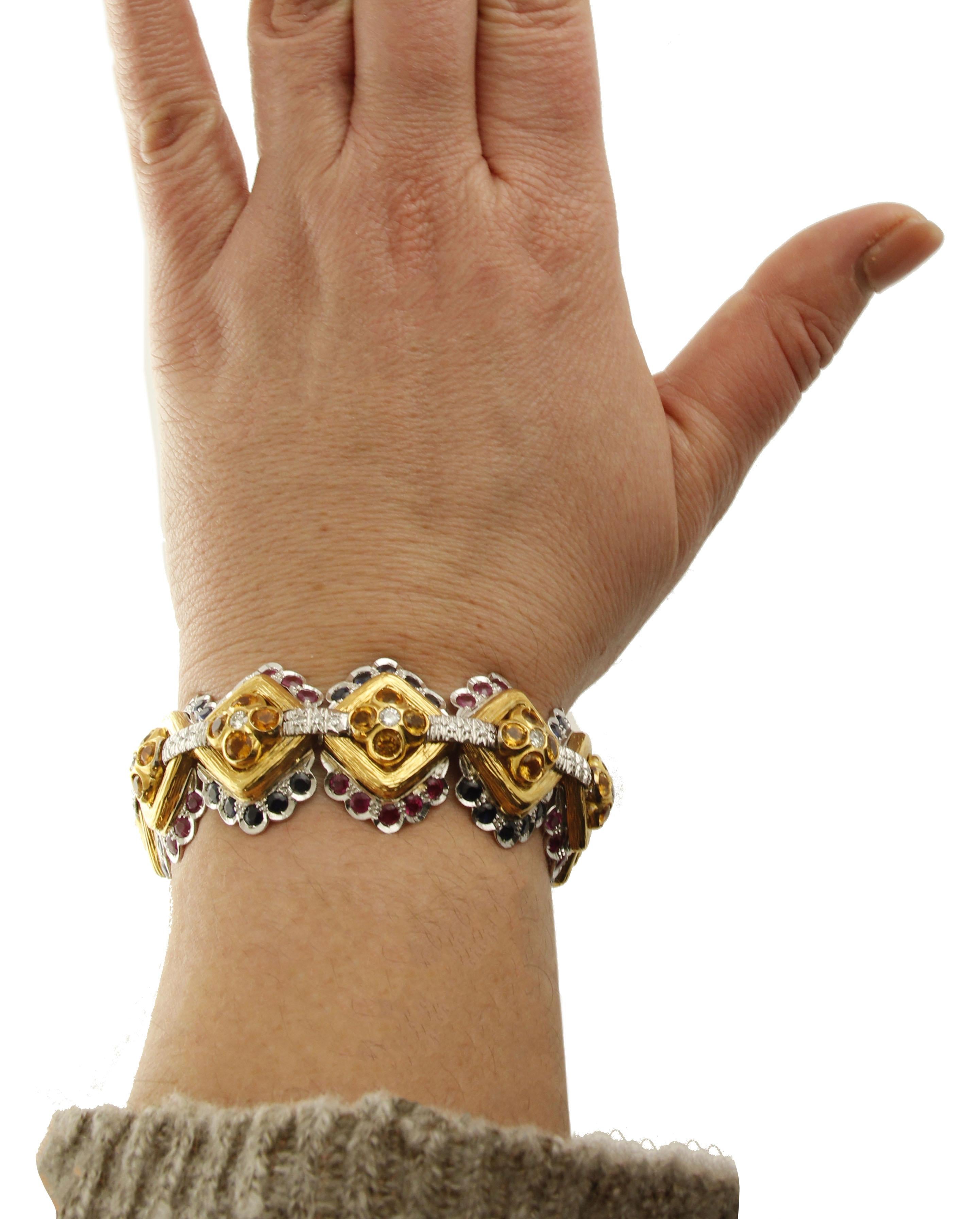 Retro White Diamonds, Blue Sapphires, Rubies White and Yellow Gold Link Bracelet For Sale