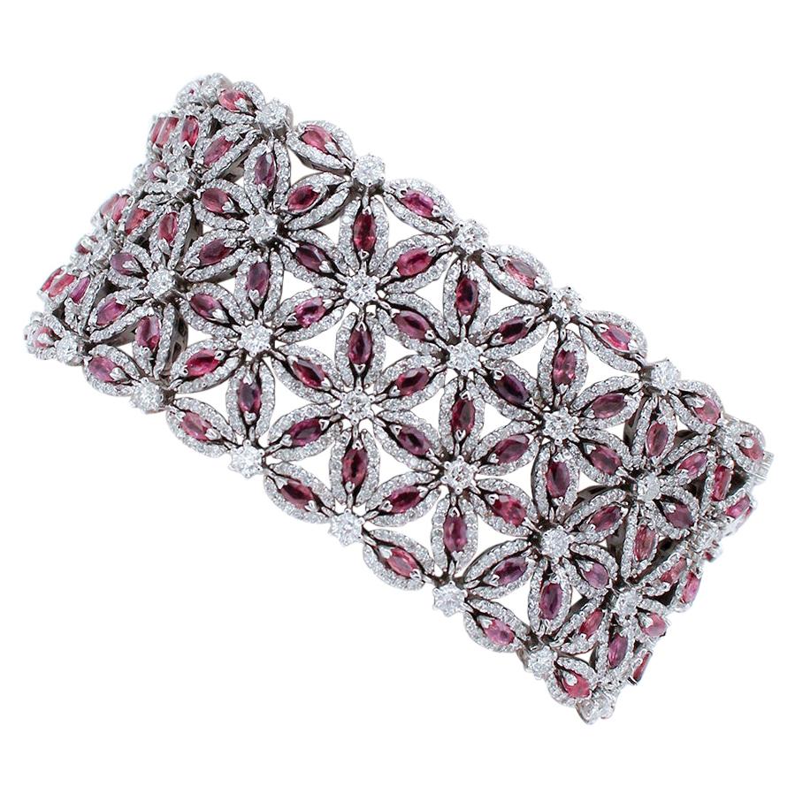 19, 44 carat White Diamonds, Rubies, 14 Karat White Gold Flower Theme Bracelet For Sale