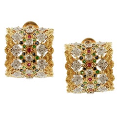 Diamanti bianchi Rubini Zaffiri blu Tsavorites Orecchini a clip in oro giallo 18 carati