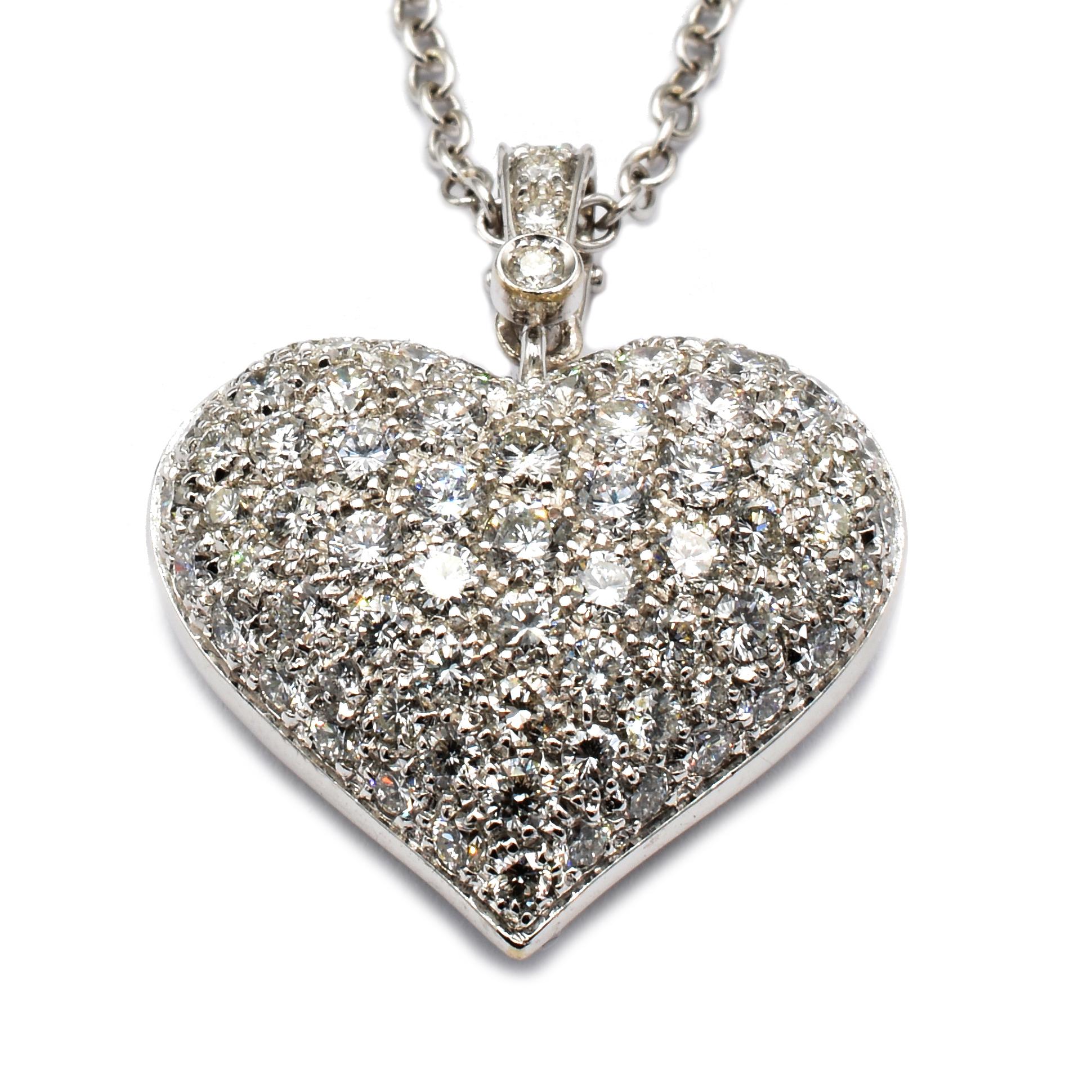 White Gold Heart Pendant Necklace with White Diamonds.
Handmade in Italy in Our Atelier in Valenza (AL).
18Kt Gold g 10.05
G Color Vs Clarity White Diamonds ct 2.43
Beautiful Heart Inlays on the back. The Pendant Clasp can be opened to fit any
