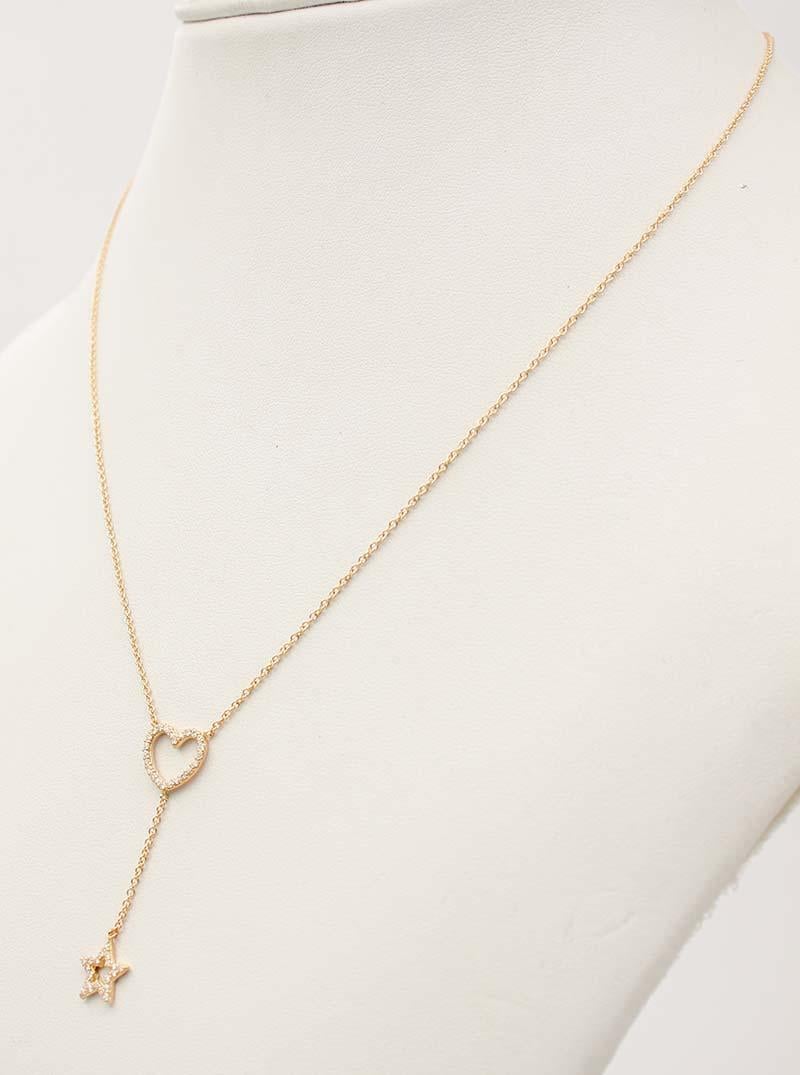 Moderne Collier pendentif en forme de cœur et d'étoile en or jaune 18 carats et diamants blancs en vente