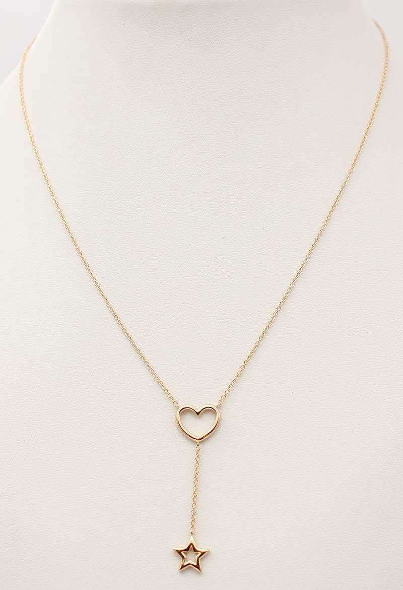 Taille ronde Collier pendentif en forme de cœur et d'étoile en or jaune 18 carats et diamants blancs en vente
