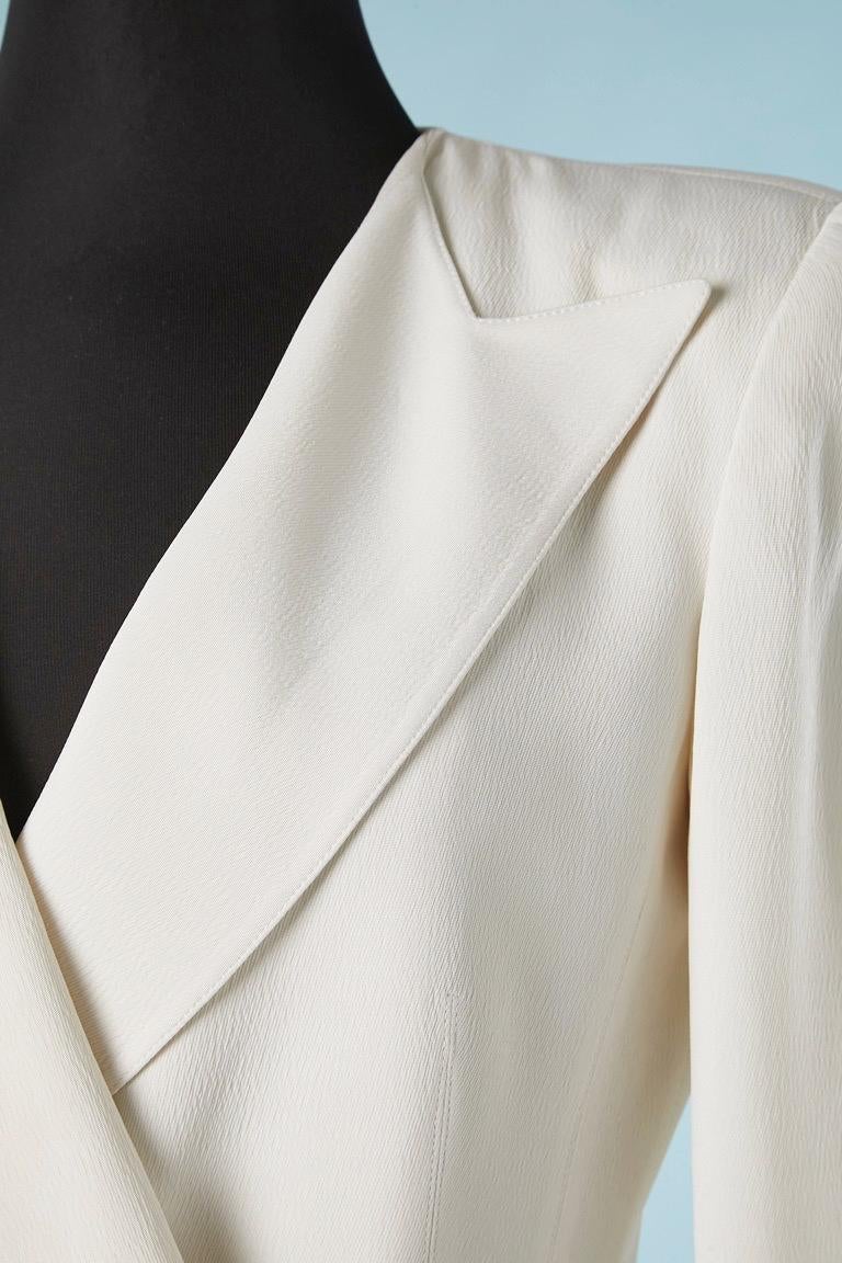 White double-breasted jacket with silver metal buttons. Fabric composition: 90% acetate, 10% silk. Lining: 61% rayon, 39%  Cupro 
SIZE 38 (M) 
