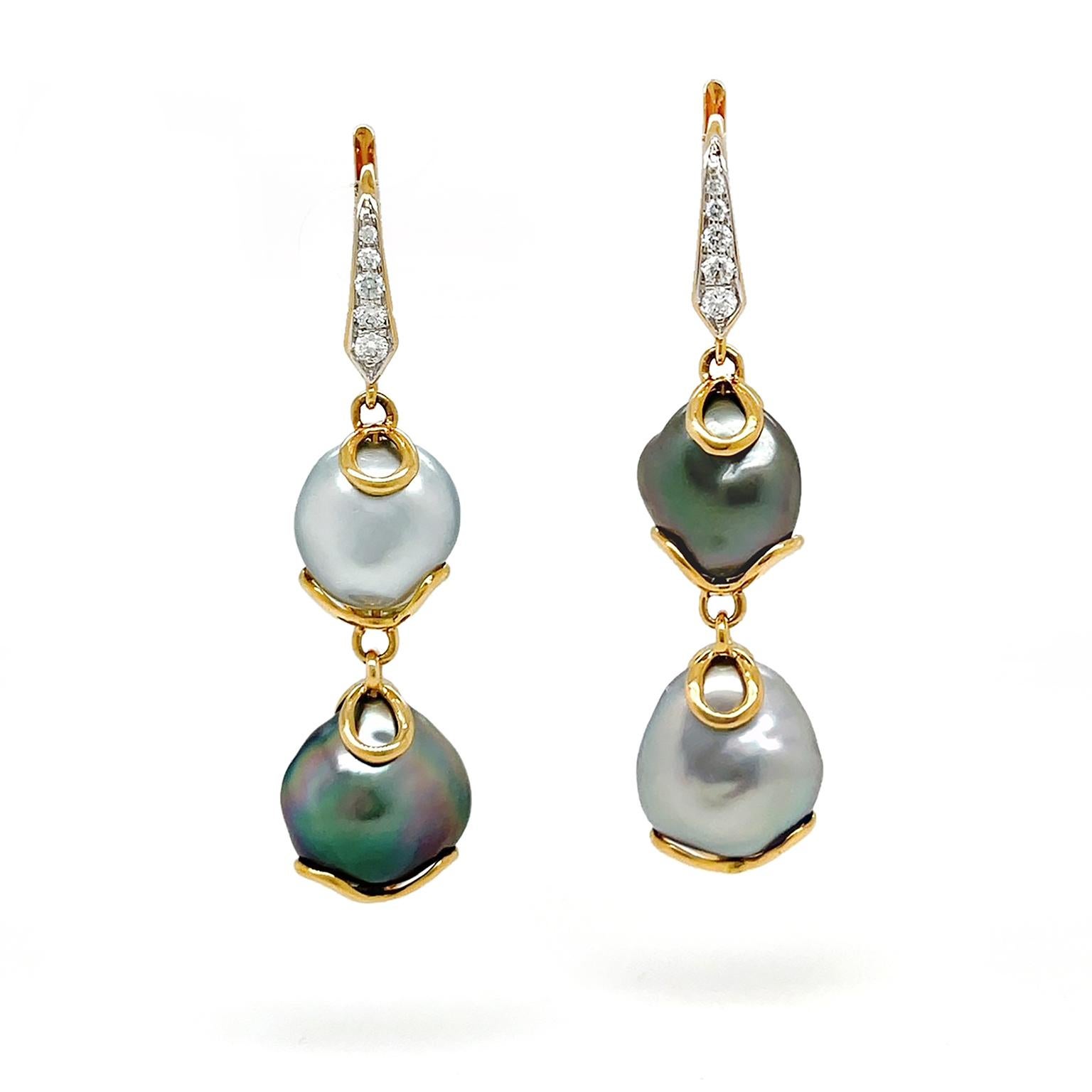 Luster and light are emitted by these drop earrings. 18k yellow gold lever backs pave set with brilliant cut diamonds lead to a baroque Keshi pearl in gray, with its prized iridescence, cradled between a pair of gold loops. This follows with an