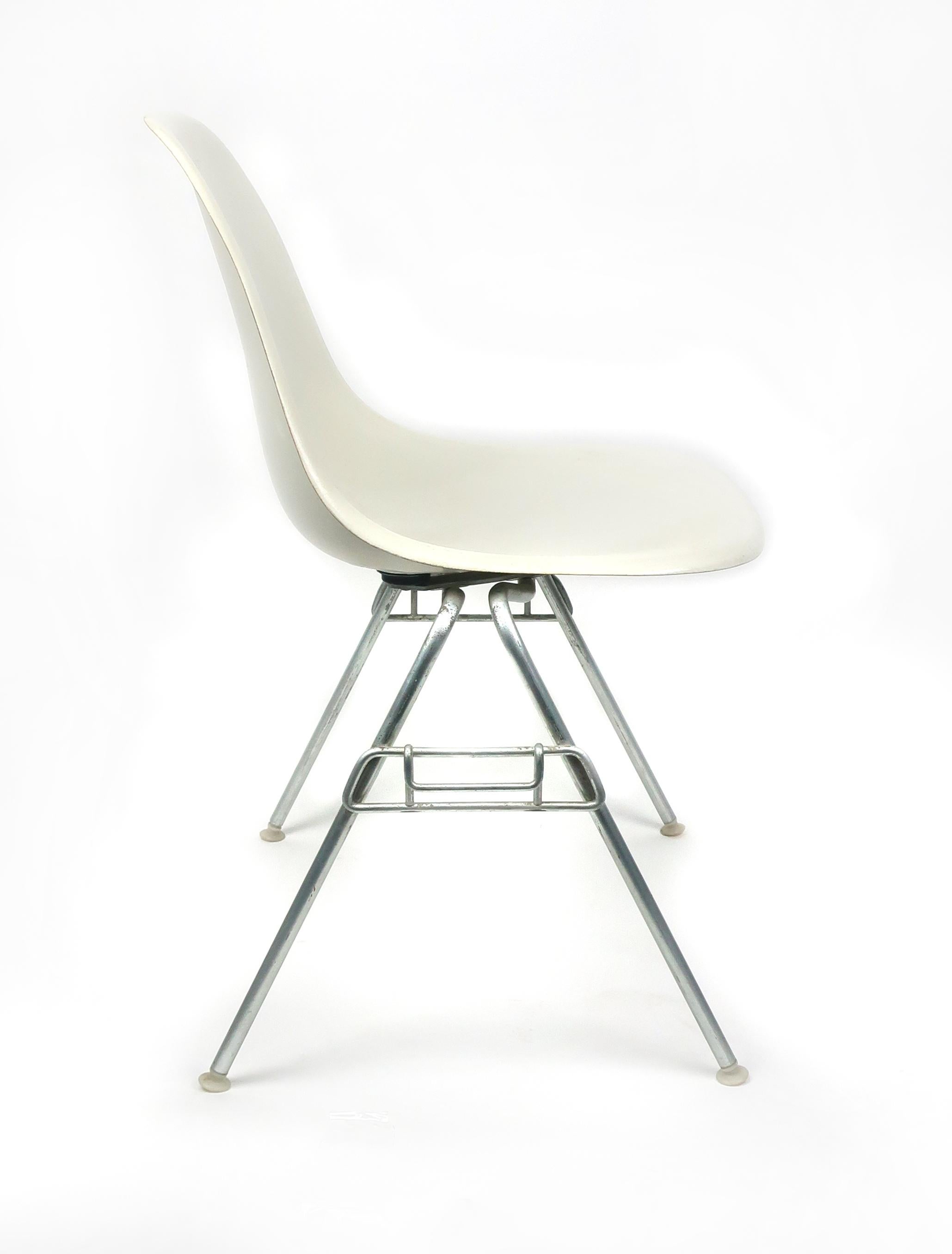 Mid-Century Modern White Eames Stacking Chairs for Herman Miller, Set of Three