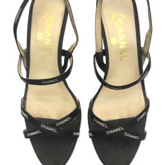 White embroidered Chanel print on black silk straps sandals heels