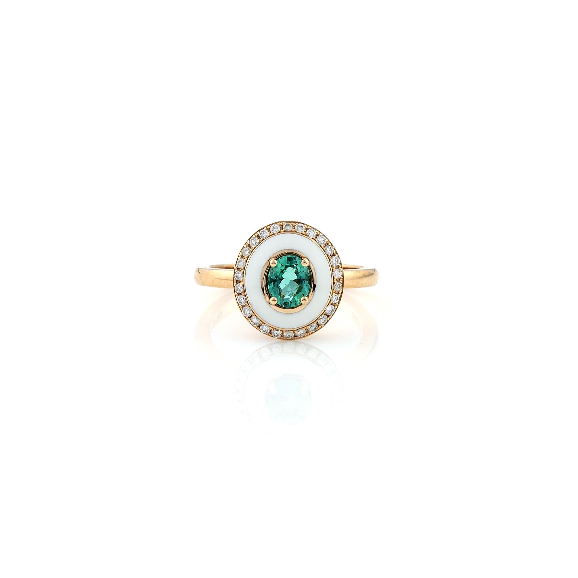 White Enamel Cocktail Ring, with Oval cut Emerald Center surrounded by brilliant cut pave Diamonds, in 18kt Rose Gold. Unique Cocktail Ring with green emerald stone, set among four prongs handcrafted in 18Kt gold. The white enameling  makes the