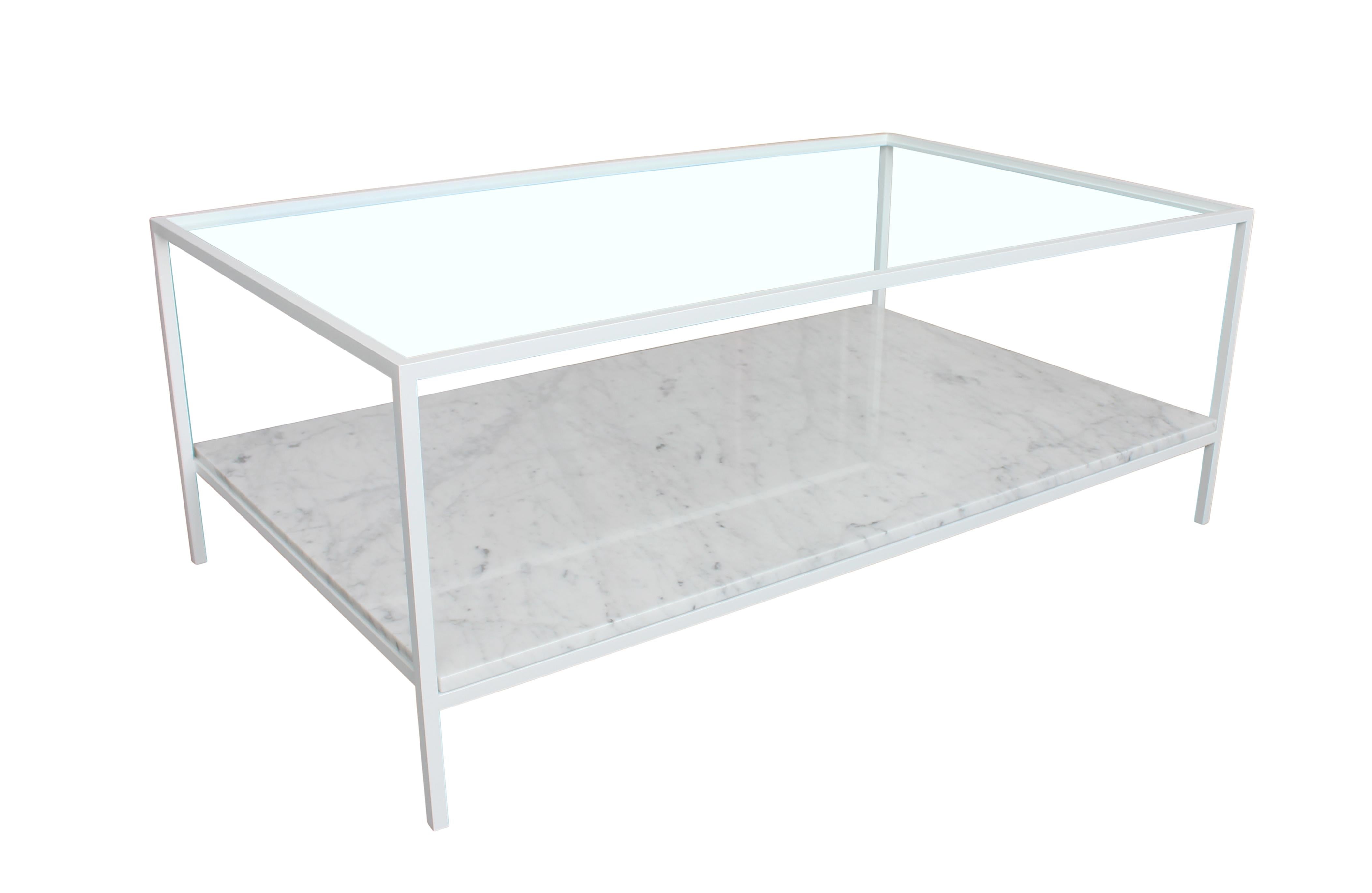 Steel frame cocktail table in matte white enamel finish with Carrara marble shelf and glass top. In stock and ready to ship, can also be custom made in any dimensions.