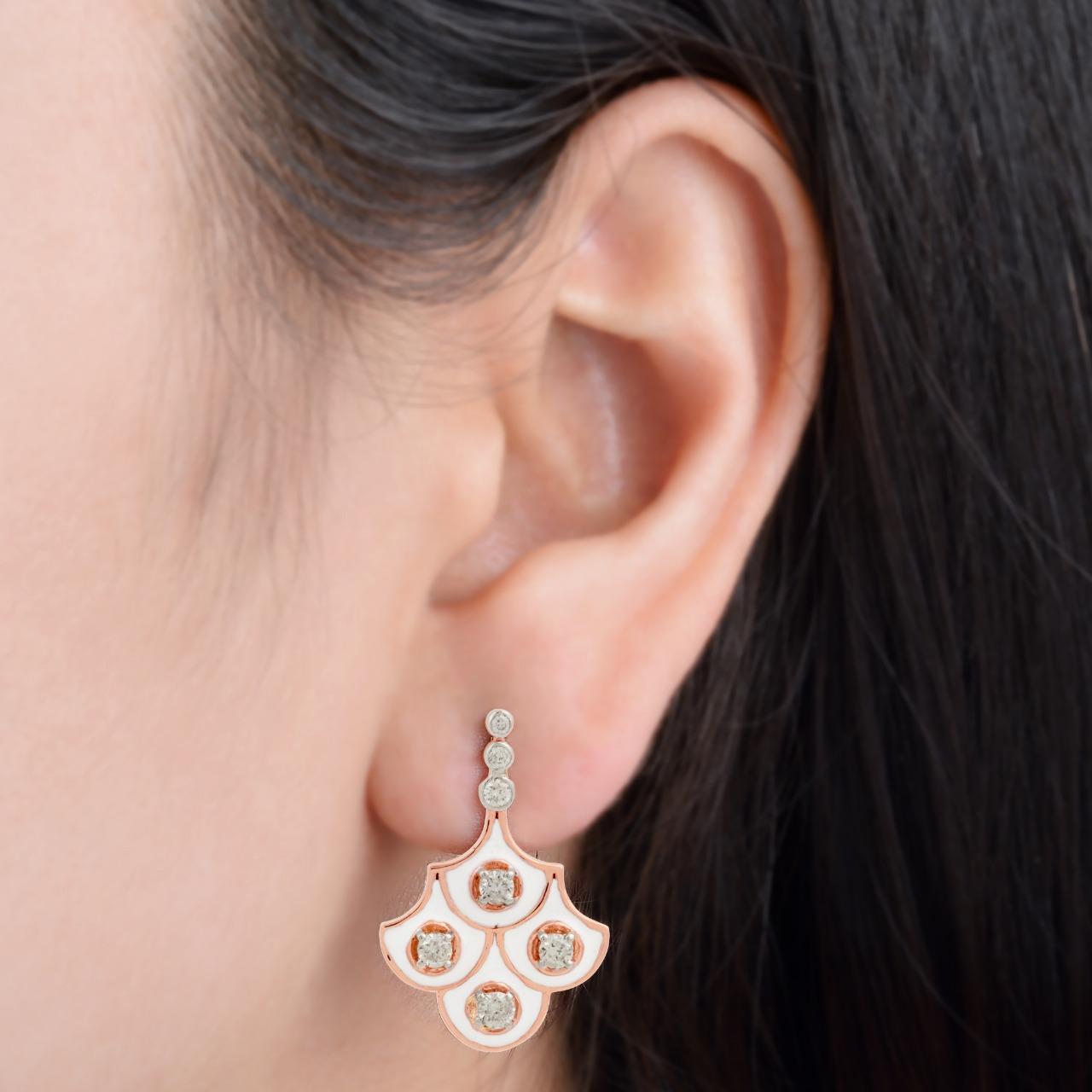 This white enamel earrings are crafted from 14-karat rose gold & set with .88 carats of sparkling diamonds. 

FOLLOW MEGHNA JEWELS storefront to view the latest collection & exclusive pieces. Meghna Jewels is proudly rated as a Top Seller on 1stdibs
