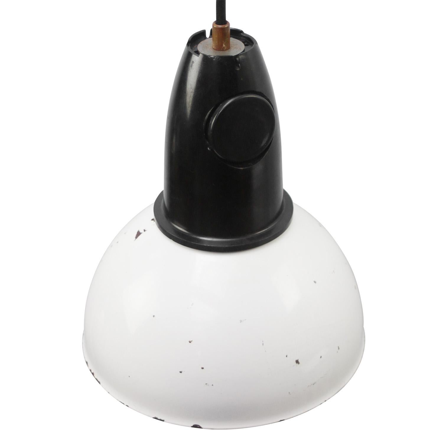 Rare industrial lamp made of white enamel with Bakelite top. 

Weight: 1.2 kg / 2.6 lb

Priced per individual item. All lamps have been made suitable by international standards for incandescent light bulbs, energy-efficient and LED bulbs. E26/E27