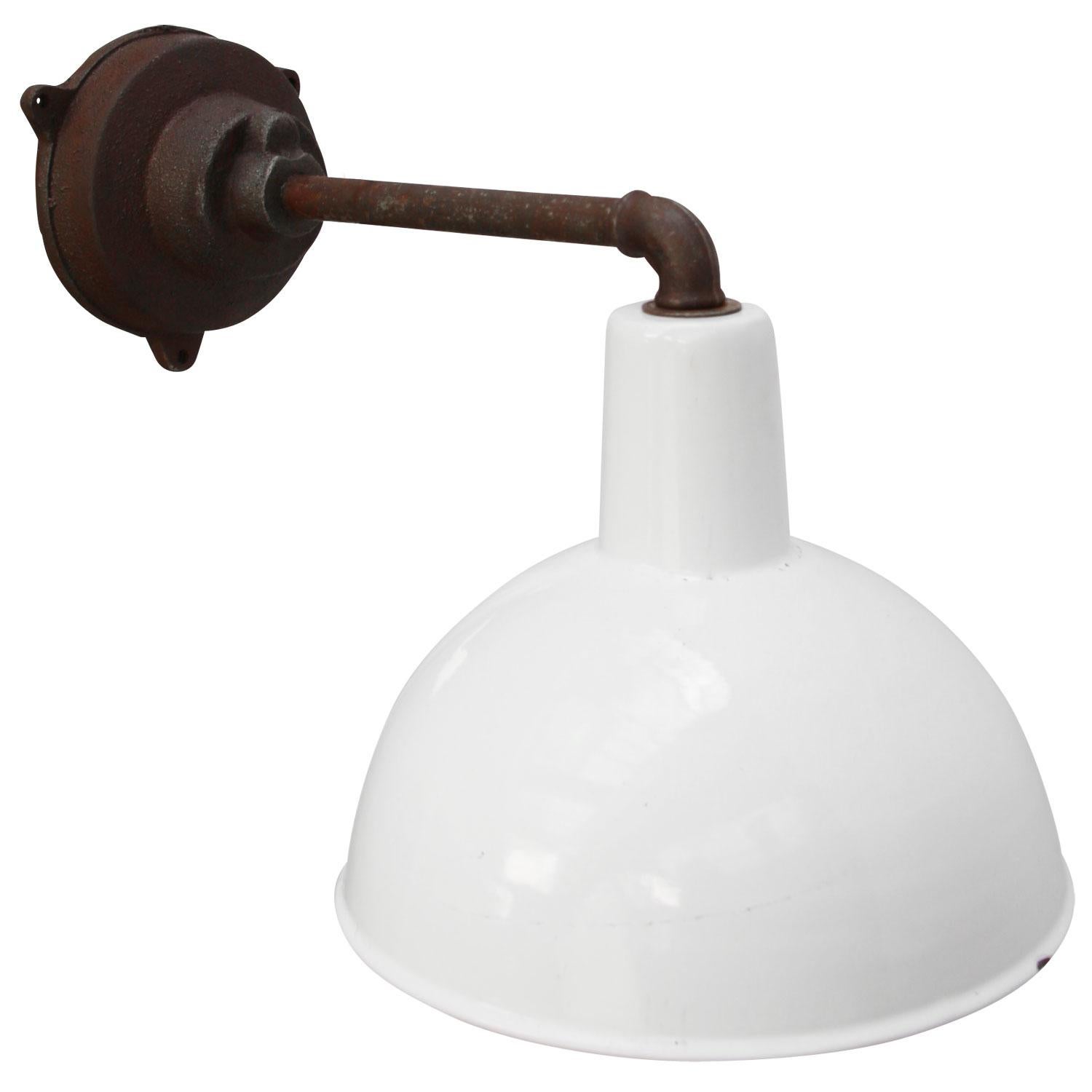 Factory wall light
white enamel, white interior

Diameter cast iron wall piece: 12 cm, 3 holes to secure

E27 / E26

Weight: 3.00 kg / 6.6 lb

Priced per individual item. All lamps have been made suitable by international standards for