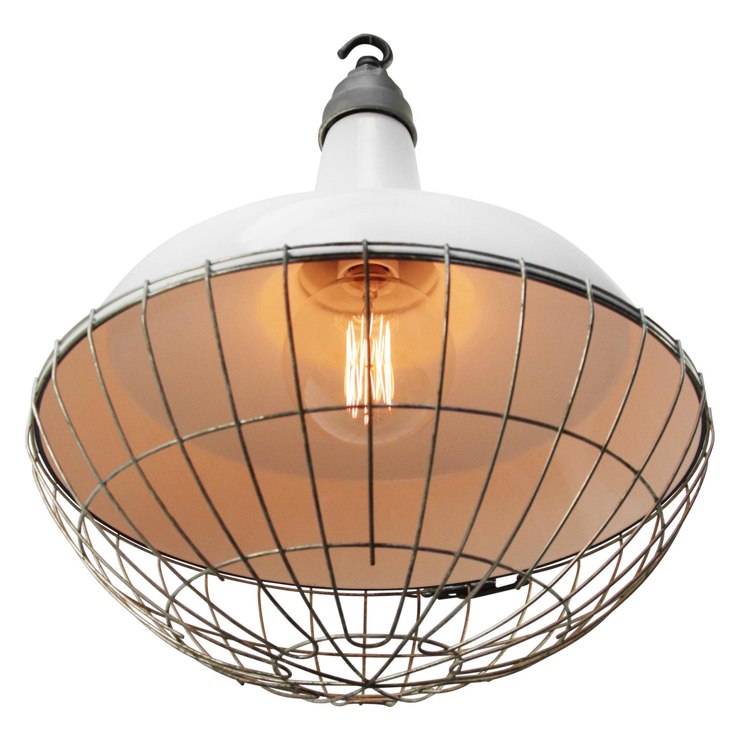 American industrial factory pendant light by Benjamin
white enamel, white interior.
Metal top and cage

Weight 3.00 kg / 6.6 lb

Priced per individual item. All lamps have been made suitable by international standards for incandescent light