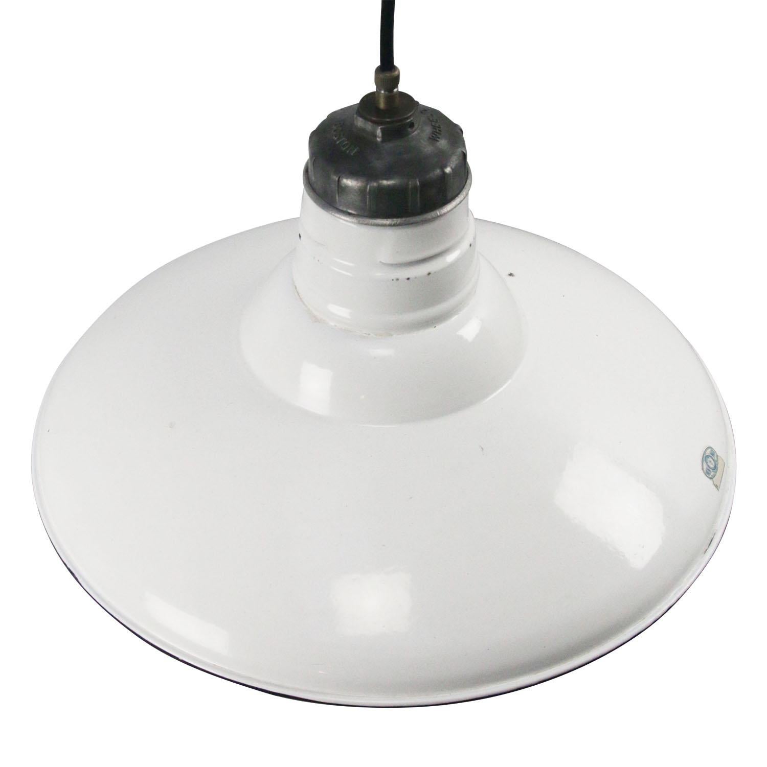 American industrial factory pendant light by Wheeler, Boston, USA.
white enamel white interior.
Metal top

Weight 1.50 kg / 3.3 lb

Priced per individual item. All lamps have been made suitable by international standards for incandescent light