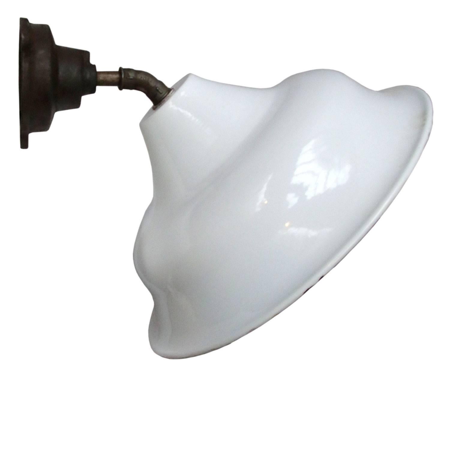 factory wall light
45 degrees
white enamel, white interior

diameter cast iron wall piece: 12 cm, 3 holes to secure

Weight: 3.9 kg / 8.6 lb

Priced per individual item. All lamps have been made suitable by international standards for