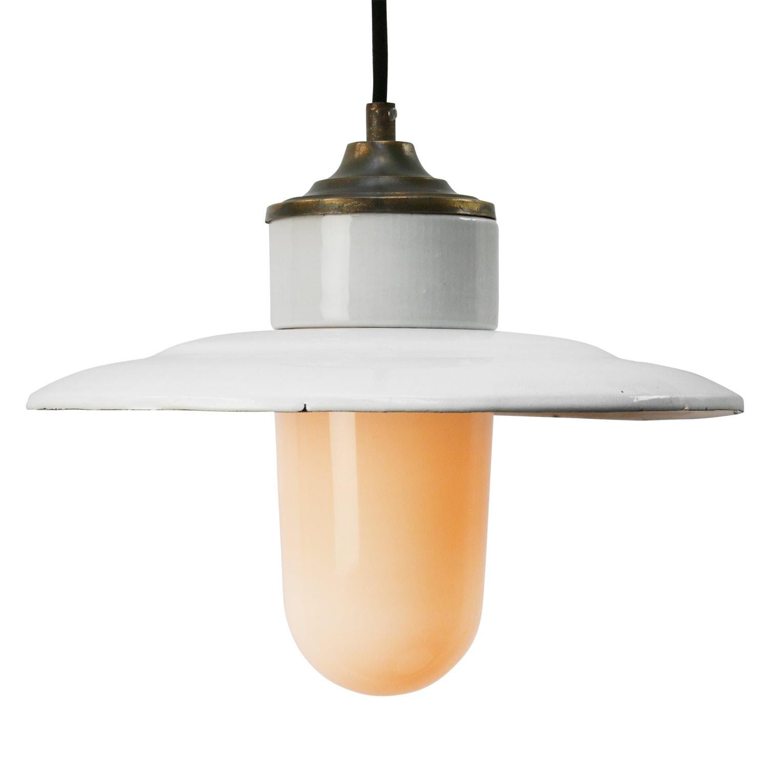 Porcelain industrial hanging lamp.
White porcelain, brass and white opaline milk glass.
White enamel shade
2 conductors, no ground.

Weight: 1.70 kg / 3.7 lb

Priced per individual item. All lamps have been made suitable by international