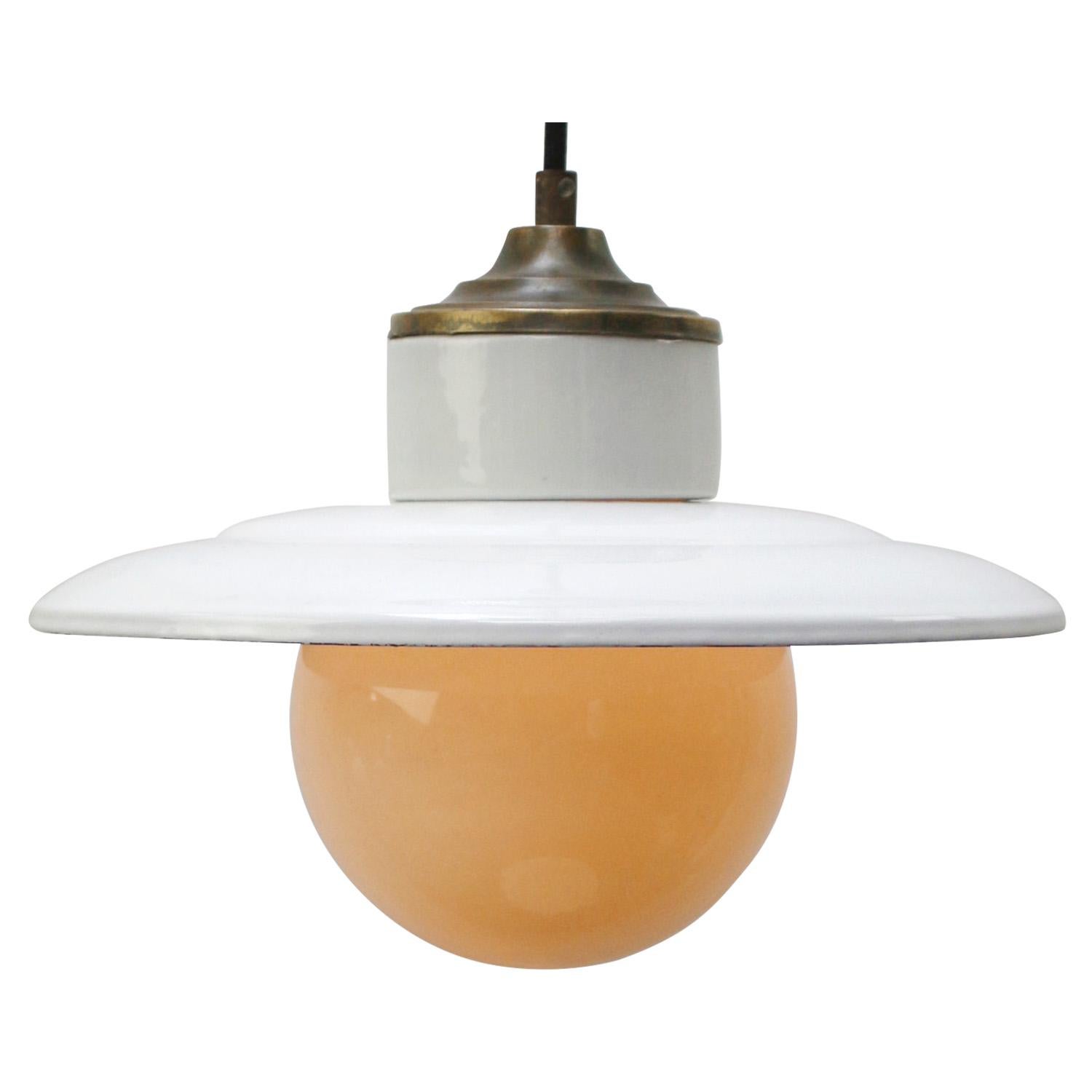 Porcelain industrial hanging lamp.
White porcelain, brass and white opaline milk glass.
White enamel shade
2 conductors, no ground.

Weight: 1.70 kg / 3.7 lb

Priced per individual item. All lamps have been made suitable by international standards