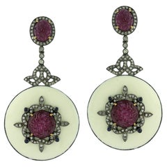 White Enameled Disc Dangle Earrings With Carved Ruby & Blue Sapphire