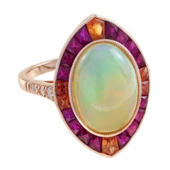 Anillo de oro rosa de 18 quilates estilo cóctel de ópalo etíope blanco, zafiro naranja y rubí