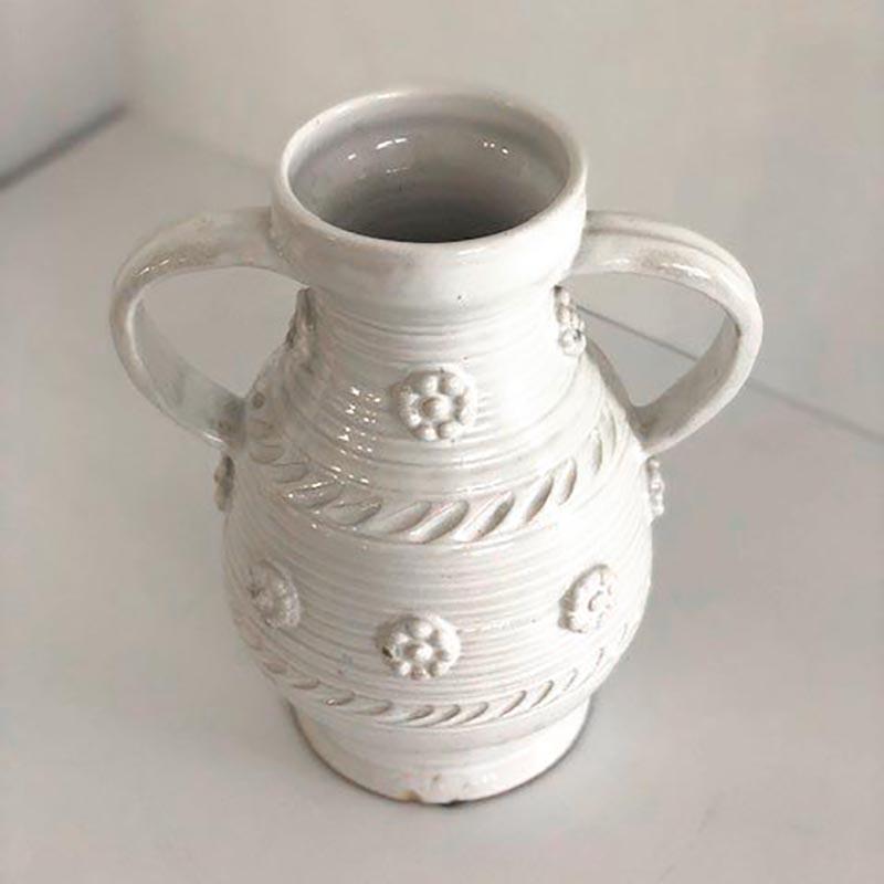 One of 7 faïence vases. The Malicorne earthenware are white glazed with different white shades.
All the pieces featured have been made between 1920 and 1950 and are signed on their bottom.