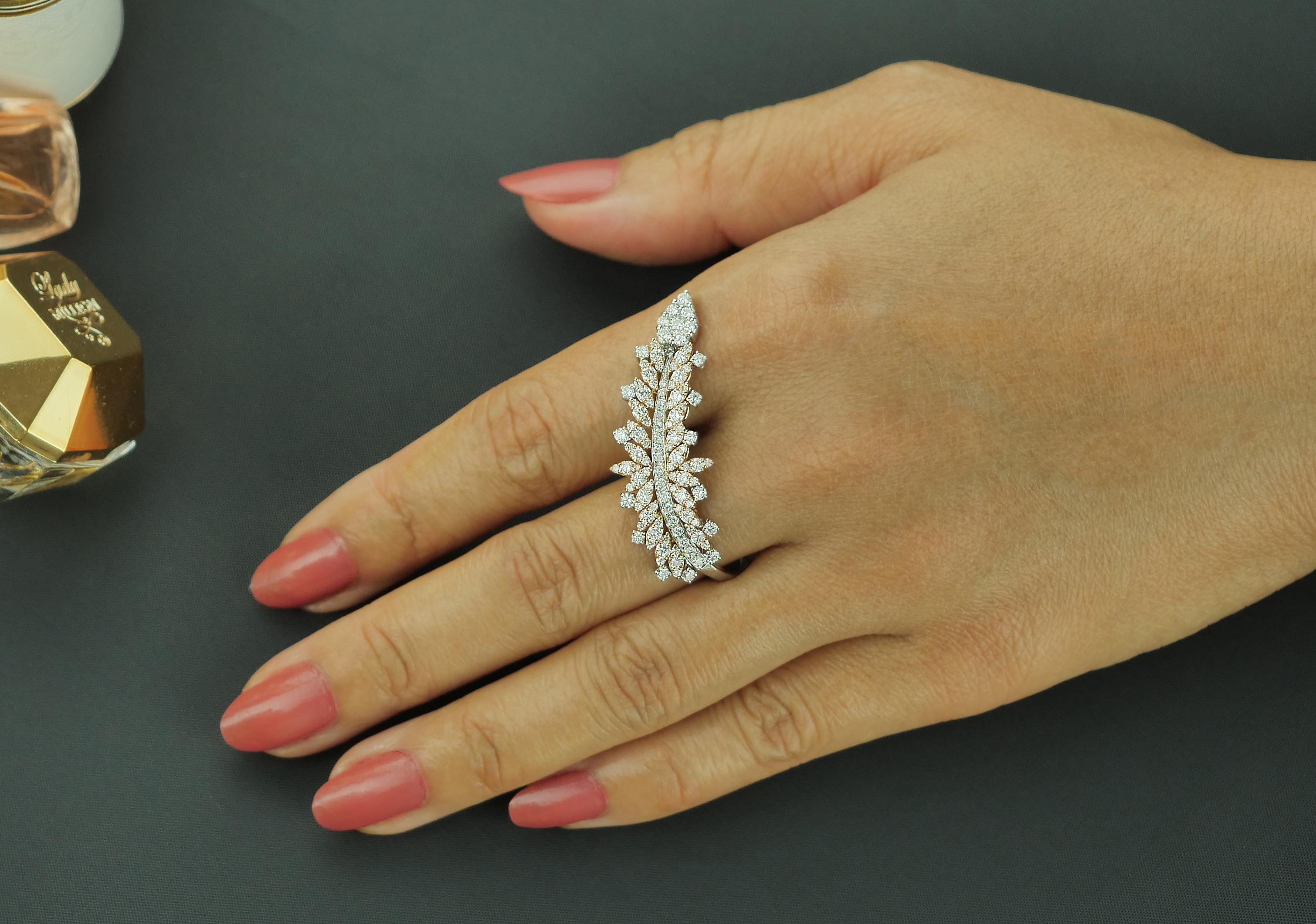 Intricate, modern statement diamond ring by Yessayan. Set in 18ct white and rose gold.
White diamonds, assessed colour G/H, assessed clarity VS
Natural Fancy Pink Diamonds, assessed colour Fancy Light Pink, assessed clarity VS
Approximate total