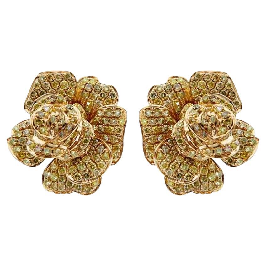 Orecchini in oro rosa 18K con diamanti bianchi e fantasia incastonati a fiore