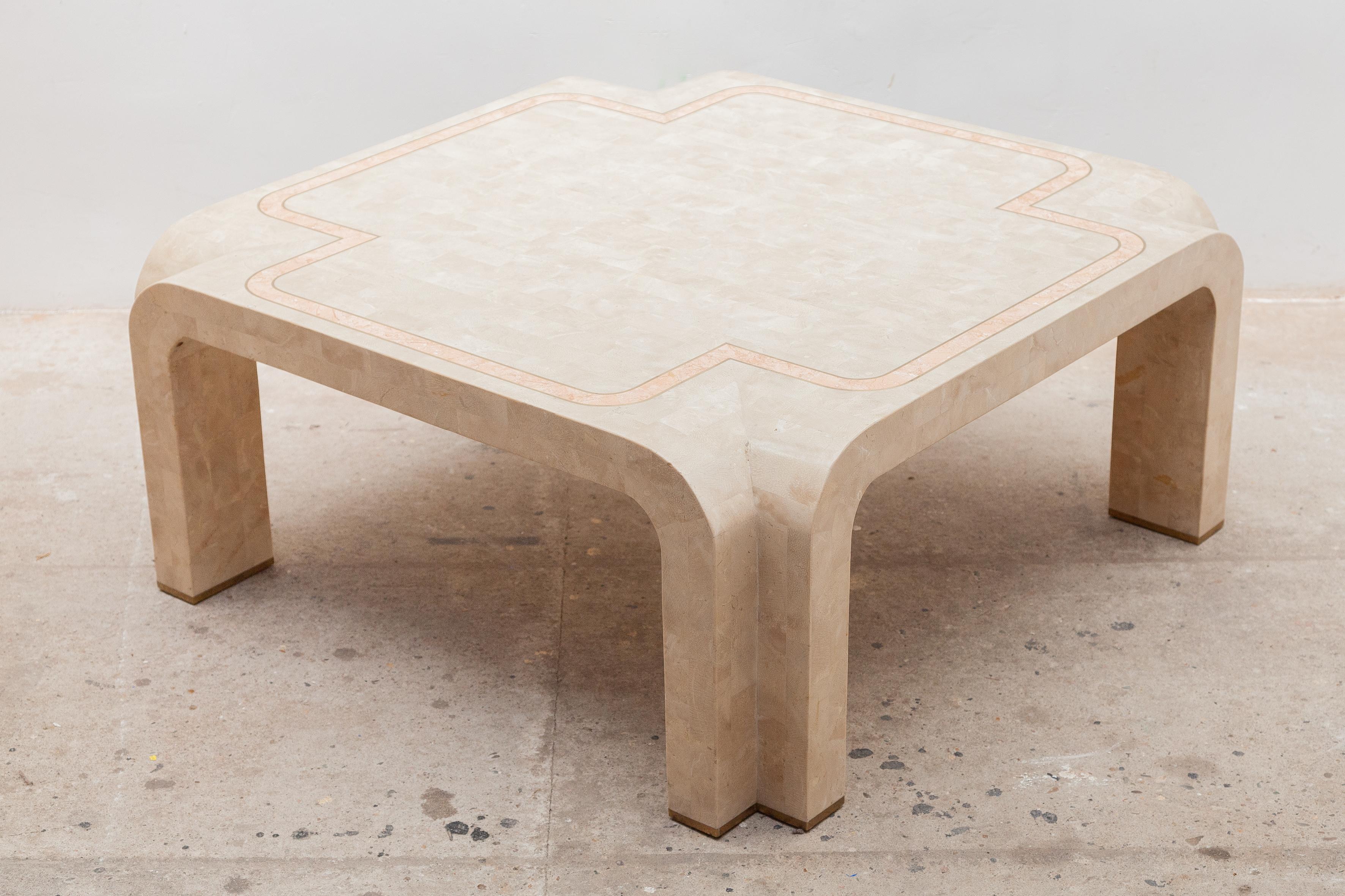 Vintage Coffee table a piece of furniture of Italian design from the 80s.Craftsmanship experimental of new materials and techniques in wood with a composite marbled stone plaster and a finishing touch in a framed pink line which makes it suitable to