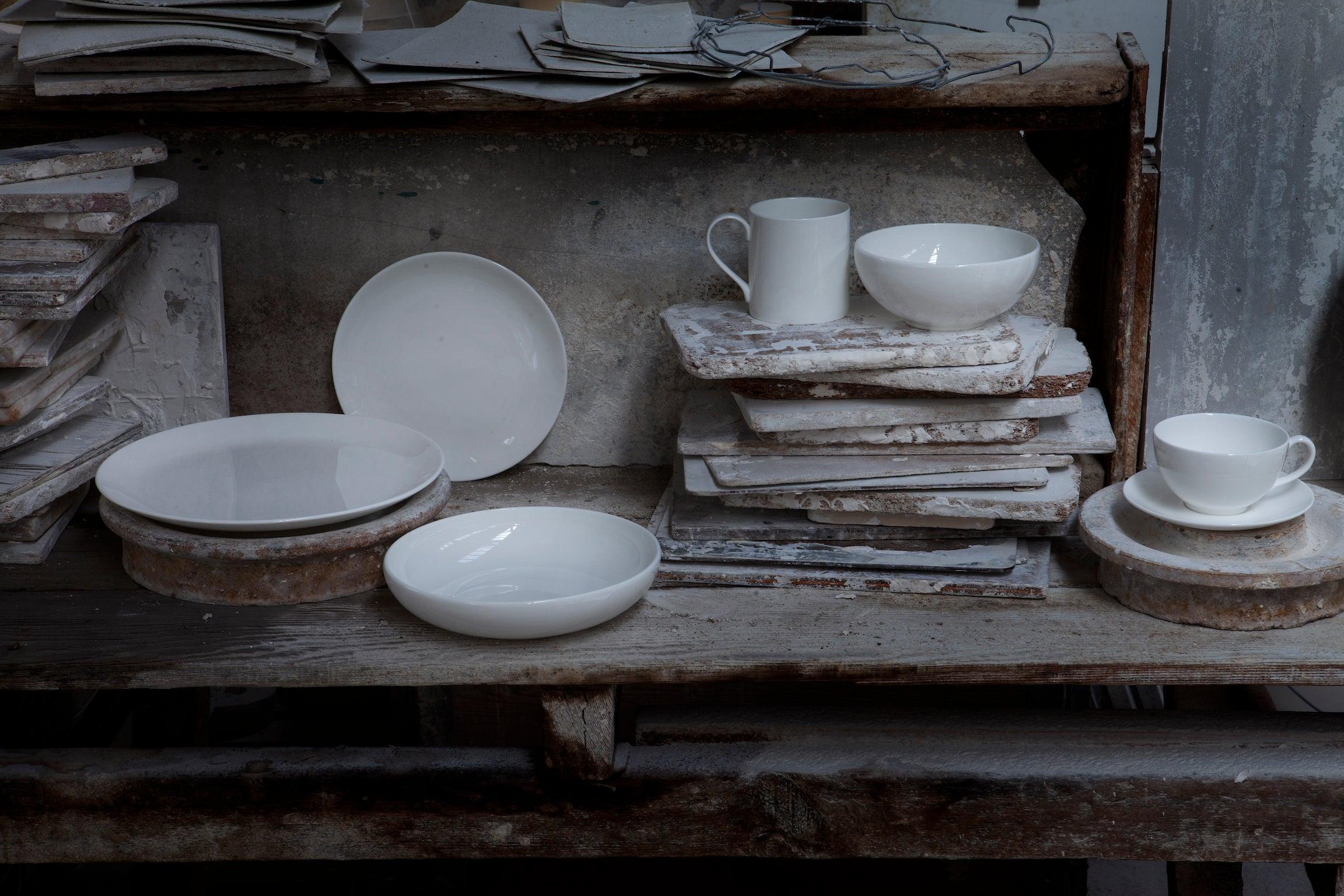 white bone china cups and saucers