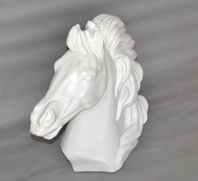 Graceful Mid-Century Modern handmade Ceramic Horse Head sculpture in white finish.
Note the detail like a real life-size Horse.
No Markings found.
 