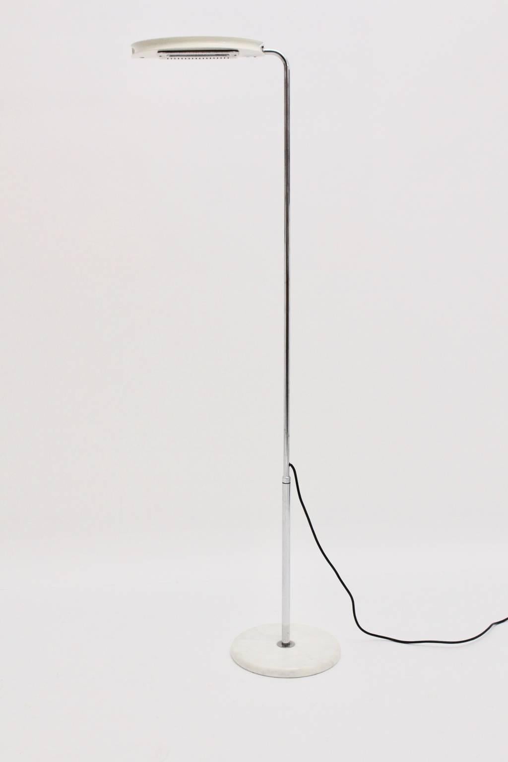 Modern white vintage floor lamp model Mezzaluna designed by Bruno Gecchelin Italy 1974 and produced by Skipper, Milano.
A gorgeous floor lamp with chrome-plated adjustable tubular steel shaft from 180 cm (70.87 in) to 197 cm (77.56 in) height, a