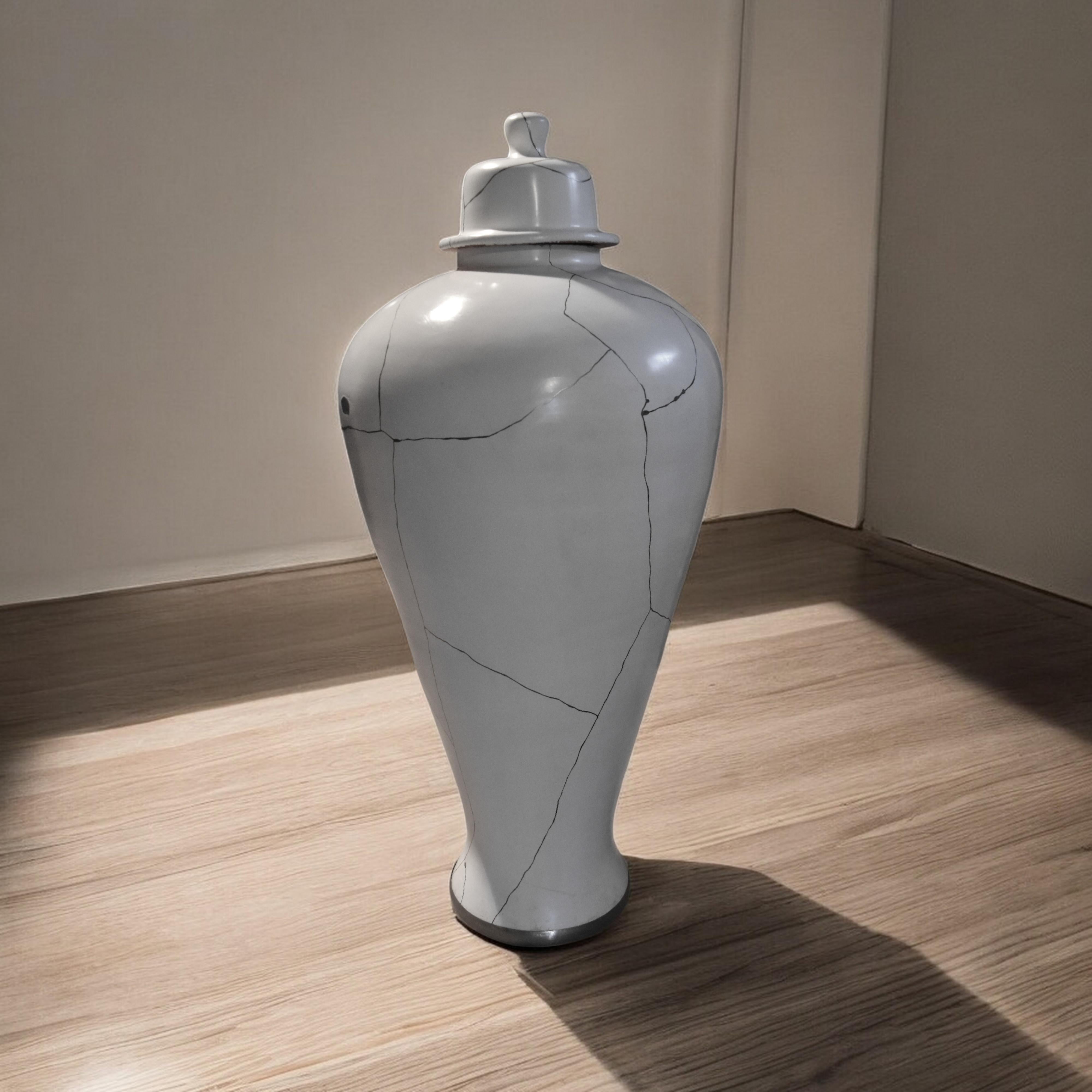 This elegant earthenware jar, an impressive 100 cm high, is based on one of the most famous vase shapes in Chinese art: the Meiping. This simple yet voluptuous silhouette dates back over 1000 years. It was long considered a tour de force for