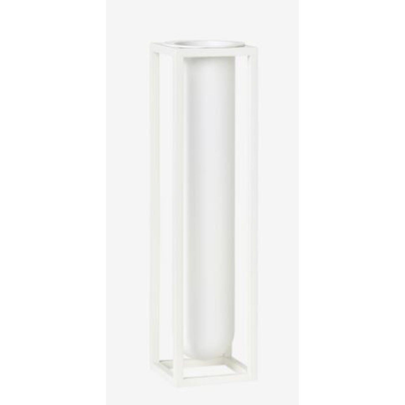 White flora Kubus vase by Lassen
Dimensions: D 6 x W 6 x H 24 cm 
Materials: Metal 
Weight: 2.00 kg

As the sun’s rays slide though the windows, invite nature inside by placing an elegant flower in the Kubus vase flora, or filling it with a