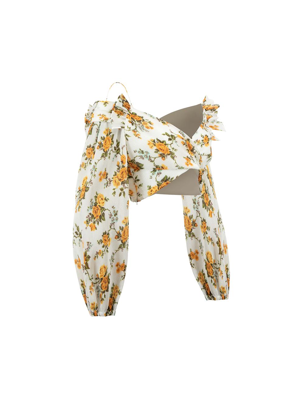 CONDITION is Very good. Hardly any visible wear to top is evident on this used Zimmermann designer resale item. 



Details


White and yellow

Polyester

Cropped top

Floral print pattern

Pleated accent

V neckline

Asymmetric detail with