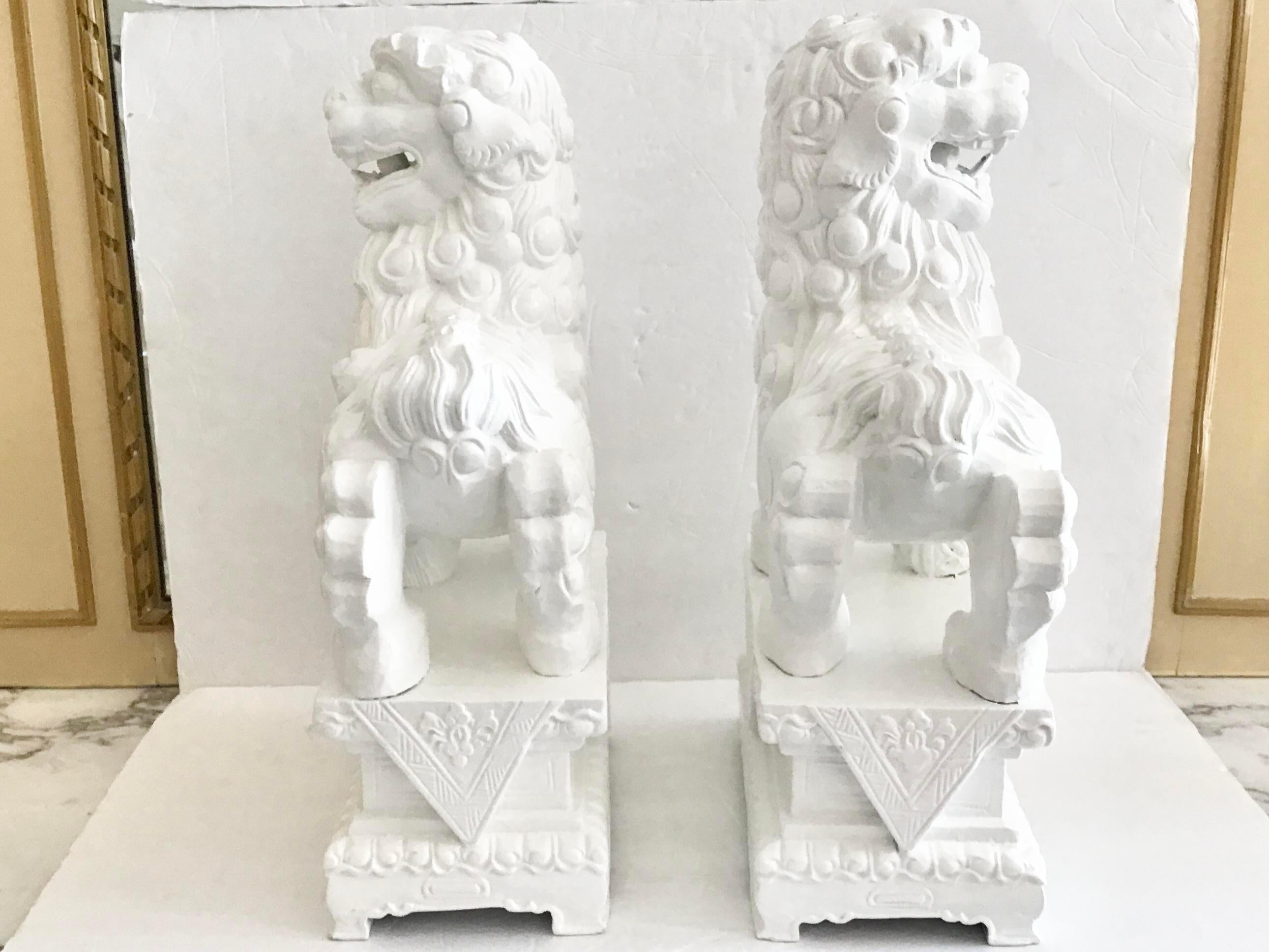 White Foo Dogs Carved in Wood Base Floral Figures, a Pair In Good Condition For Sale In Los Angeles, CA