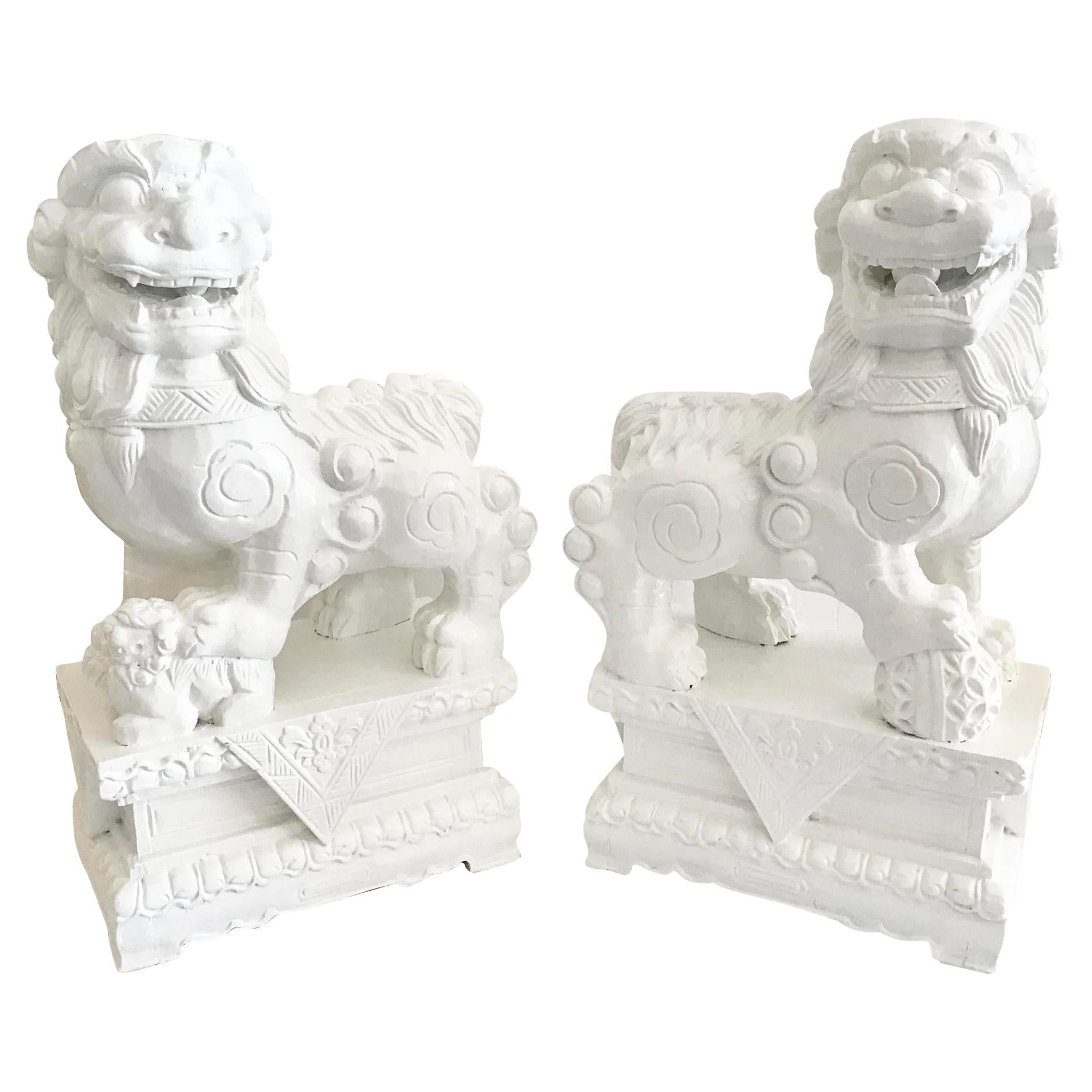 White Foo Dogs Carved in Wood Base Floral Figures, a Pair For Sale